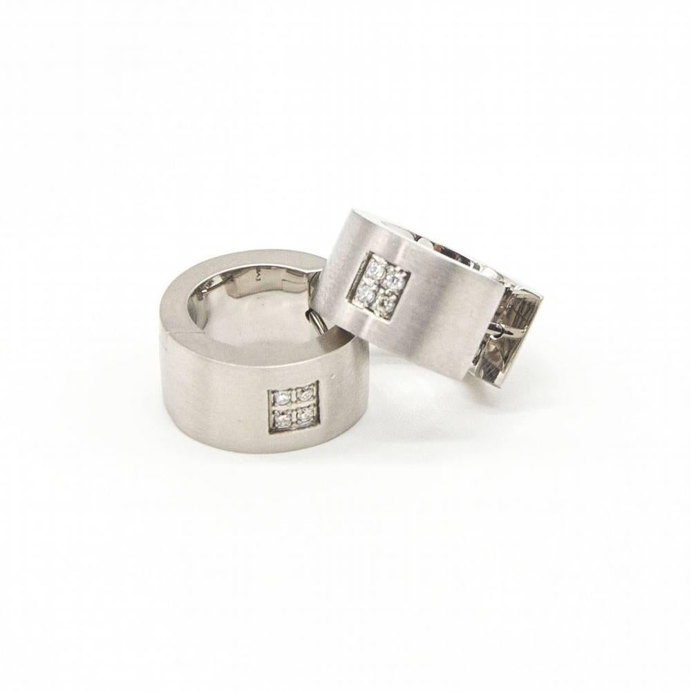 Orecchini in acciaio e diamanti per donna : 8x 0,08ct Diamanti taglio Brilliante : Acciaio 316L : 9,02 grammi : Diametro 15mm, Larghezza 8mm : Articolo nuovo di zecca: Ref.:D363919SO
