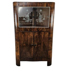 Art Deco corner display case in walnut burl with sliding glass and compartment