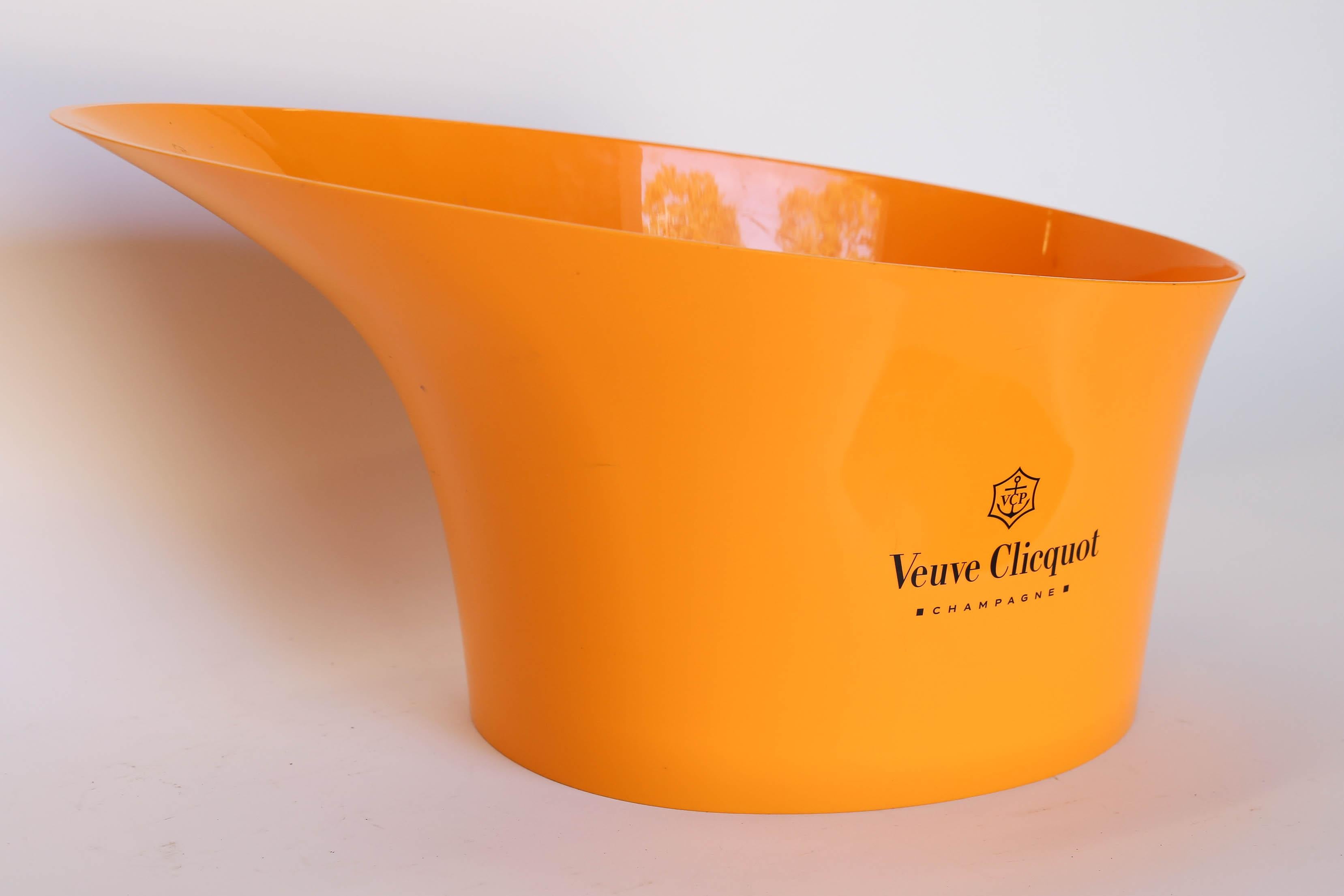 A fabulous plastic double or magnum champagne cooler from the House of Veuve Clicquot. A wonderful addition to your bar or to use poolside. The iconic orange color of Veuve Clicquot makes this a much sought after piece.