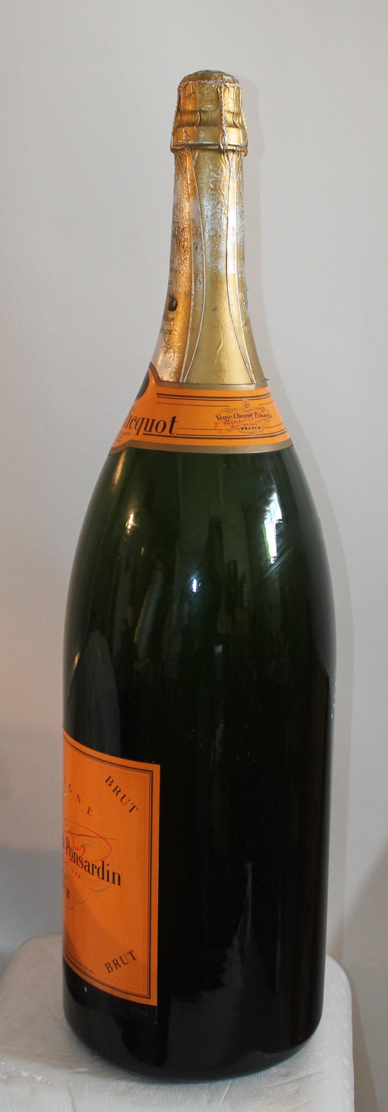 Veuve Clicquot Champagne bottle from a bar display or storefront. Great as found condition.