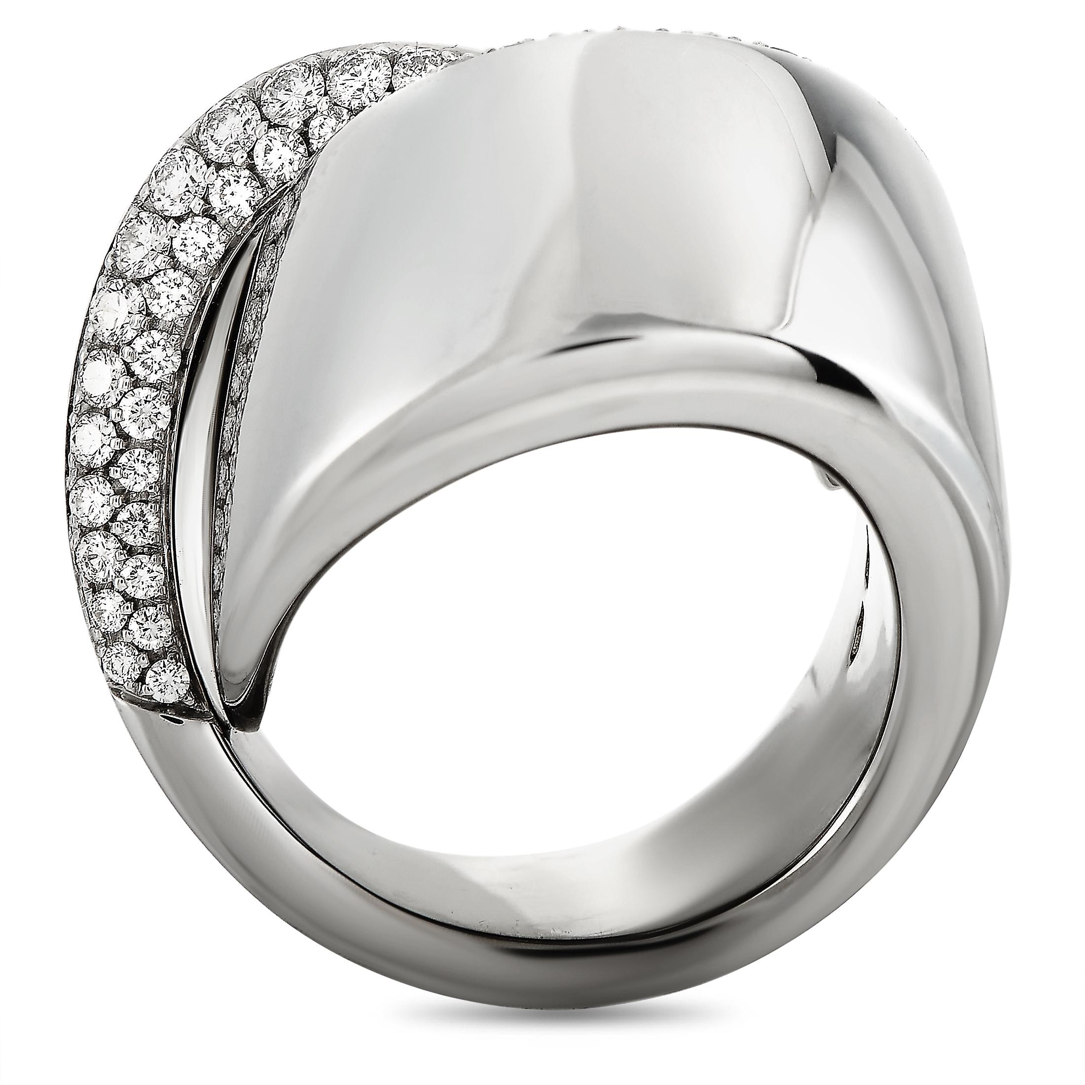 The Vhernier “Abbraccio” ring is crafted from 18K white gold and weighs 26 grams, boasting band thickness of 18 mm and top height of 10 mm, while top dimensions measure 25 by 25 mm. The ring is set with diamonds that amount to 1.17 carats.

This