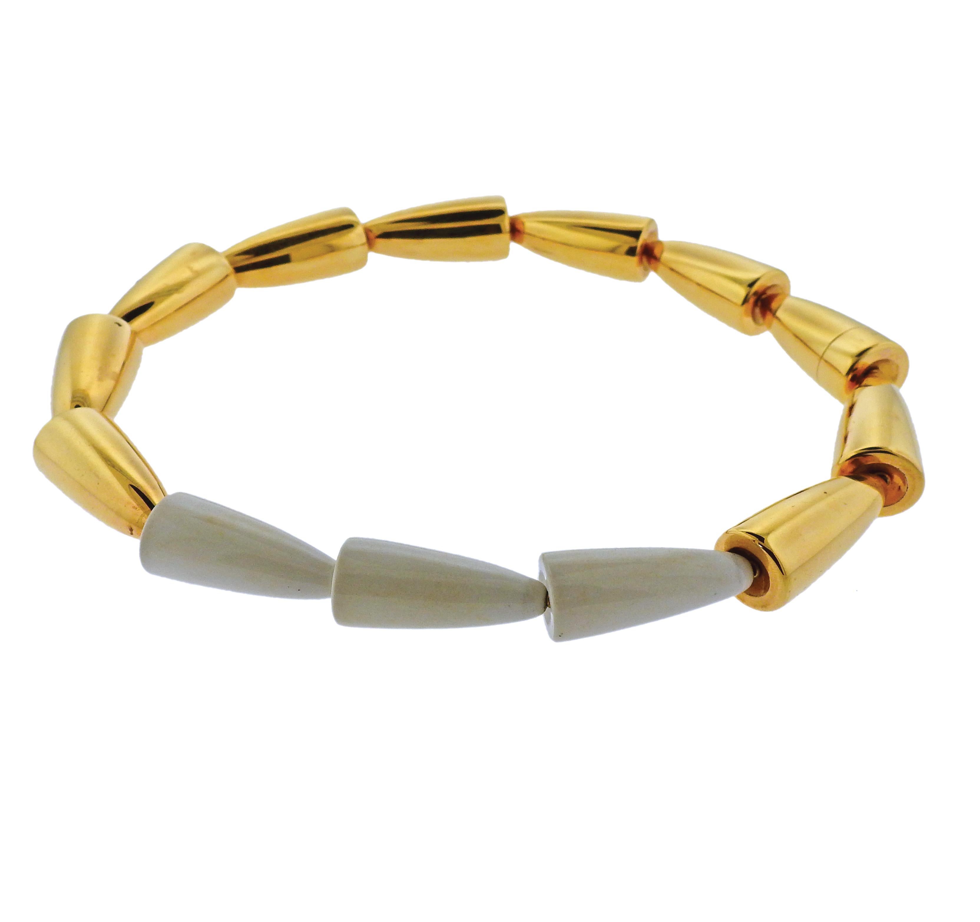 Vhernier Calla 18k gold necklace, featuring white kogolong links.  Necklace is 17.5