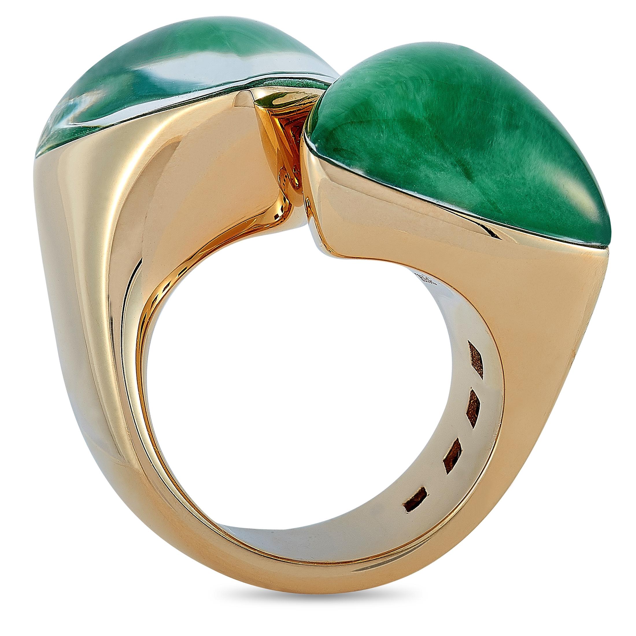 The Vhernier “Freccia” ring is made of 18K rose gold and embellished with jade and rock crystal. The ring weighs 18 grams and boasts band thickness of 9 mm and top height of 11 mm, while top dimensions measure 32 by 20 mm.
Ring Size: 6

This item is