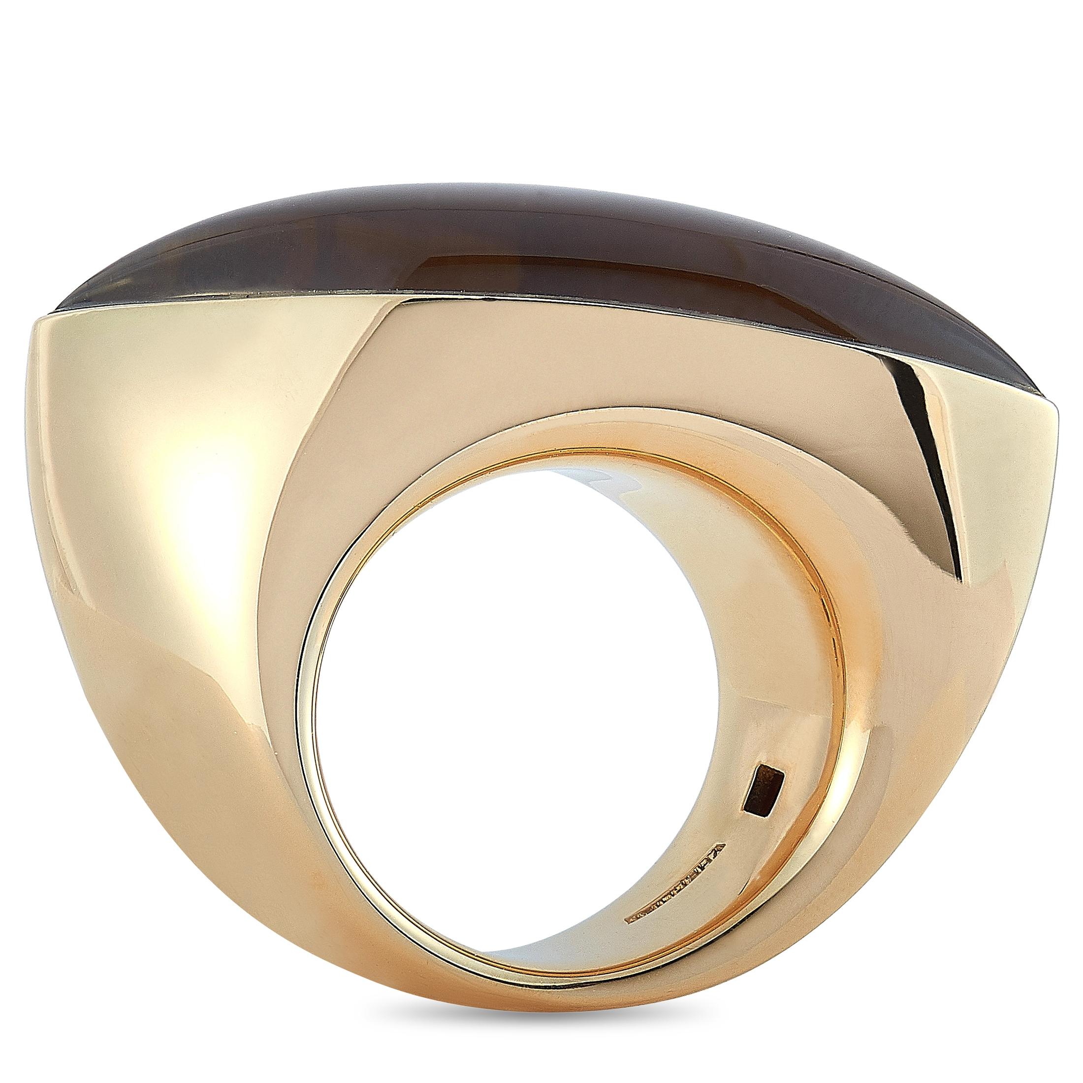 The Vhernier “Fuseau” ring is made of 18K rose gold and embellished with smoky quartz and white mother of pearl. The ring weighs 20.3 grams and boasts band thickness of 7 mm and top height of 10 mm, while top dimensions measure 35 by 10 mm.
Ring