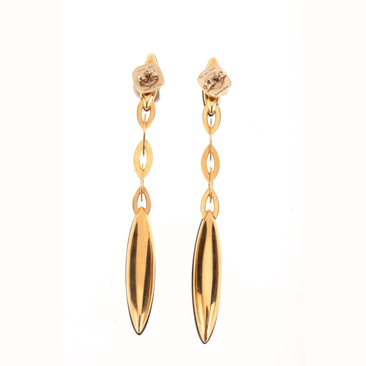 The fuseau earrings combine classic rose gold with the vernier classic trasparencies create with layers of fume quartz   mother of pearls and rock crystal.inspired  by the elegant shape of a spindle they move and dance thanks to the refine links