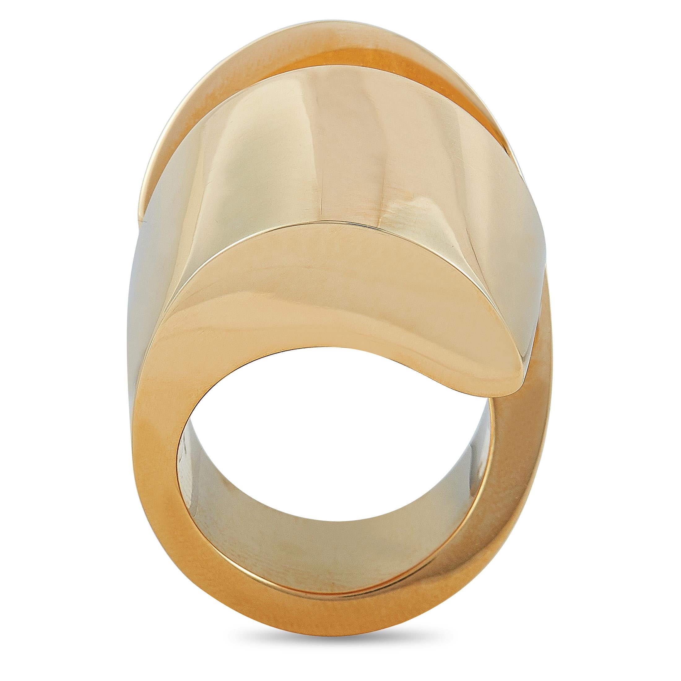 The Vhernier “Kiss” ring is crafted from 18K rose gold and weighs 26.4 grams, boasting band thickness of 10 mm and top height of 12 mm.
Ring Size: 7

This item is offered in brand new condition and includes the manufacturer’s box.