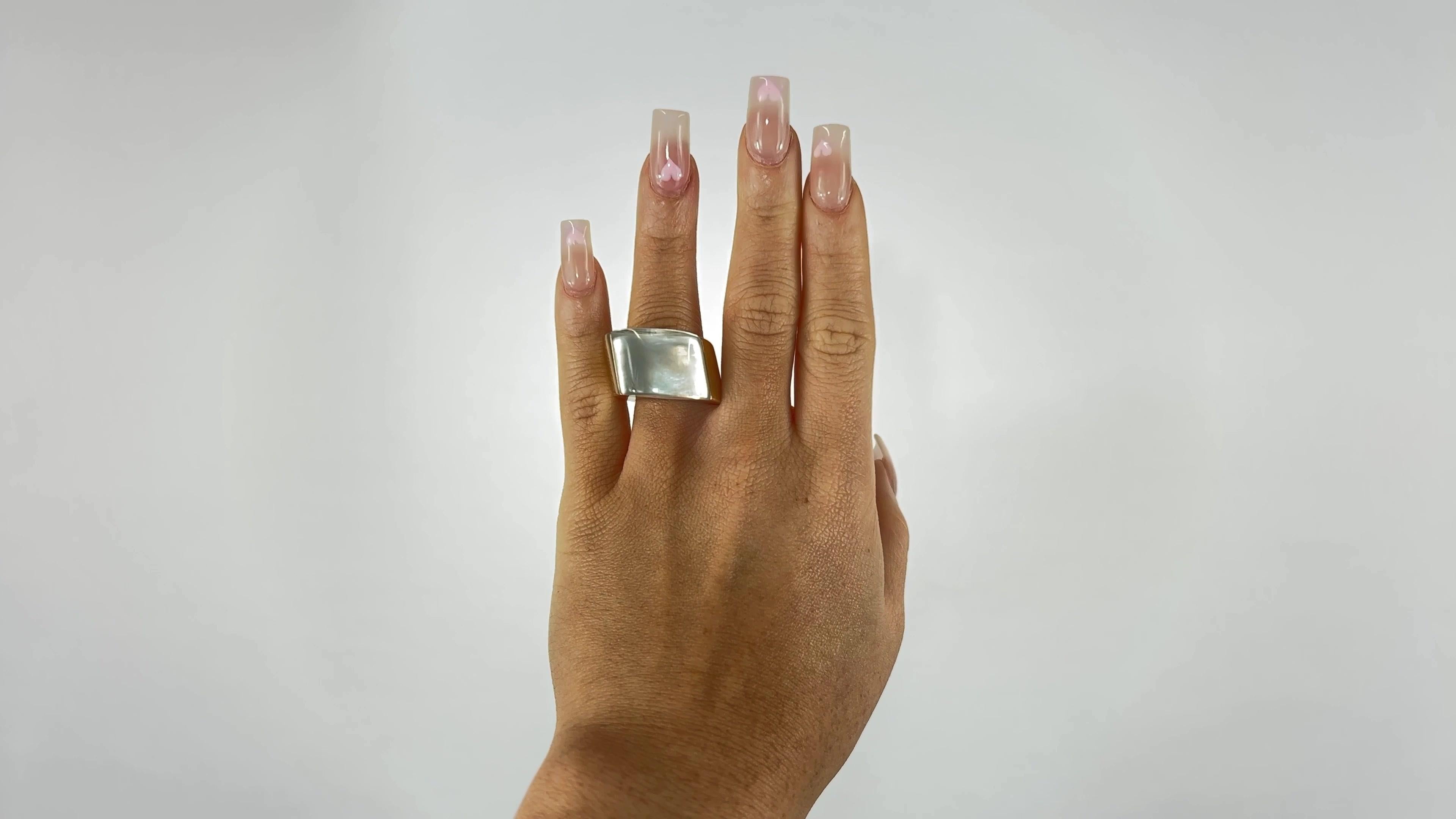 One Vhernier Mother-of-Pearl 18 Karat Gold Cocktail Ring. Featuring mother of pearl and polished rock crystal. Crafted in 18 karat yellow gold, signed Vhernier with Italian hallmarks. Purchased in 2014 for $9,350. Circa 2000s. Ring size 7 and may be