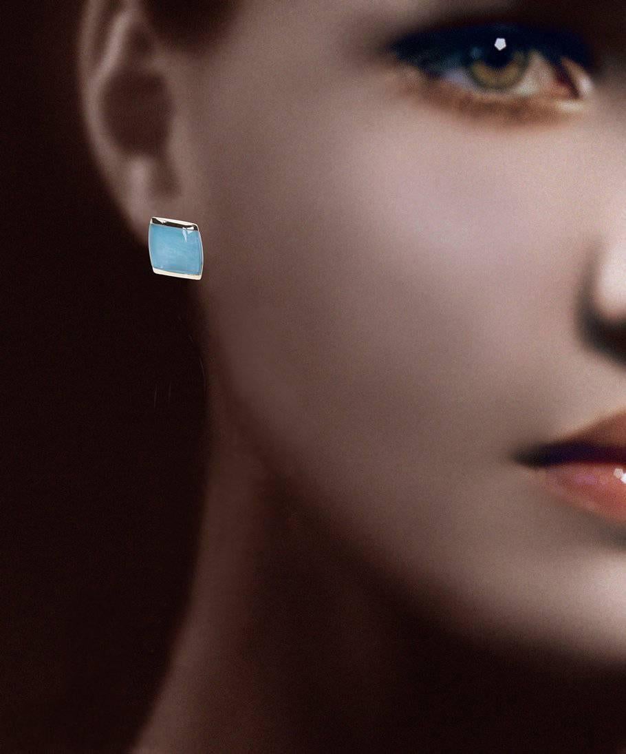 A Pair of "Vhernier" 18 Karat Rose Gold "Plateau" Ear Clips in Turquoise, Mother of Pearl, and Crystal Quartz.

Stamped: VHERNIER, 750, 20B, *3229 AL

Suggested Retail: $6400