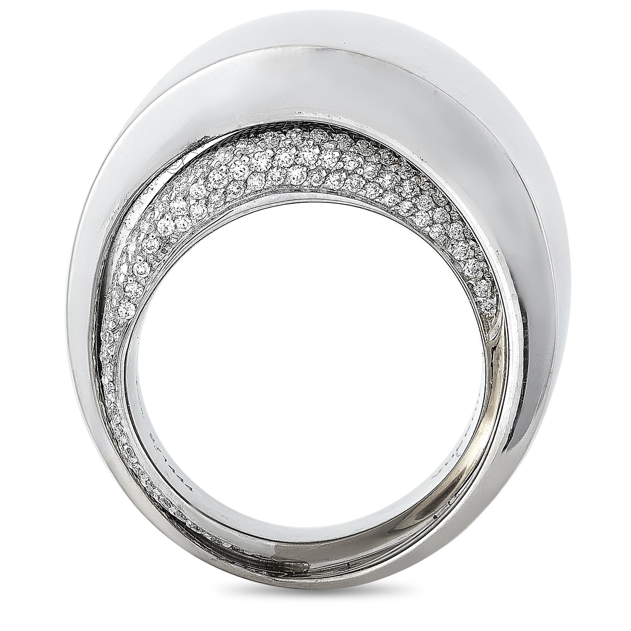 The Vhernier “Tourbillon” ring is crafted from 18K white gold and weighs 33.2 grams, boasting band thickness of 7 mm and top height of 9 mm. The ring is set with diamonds that amount to 1.03 carats.
Ring Size: 6.5

This item is offered in brand new
