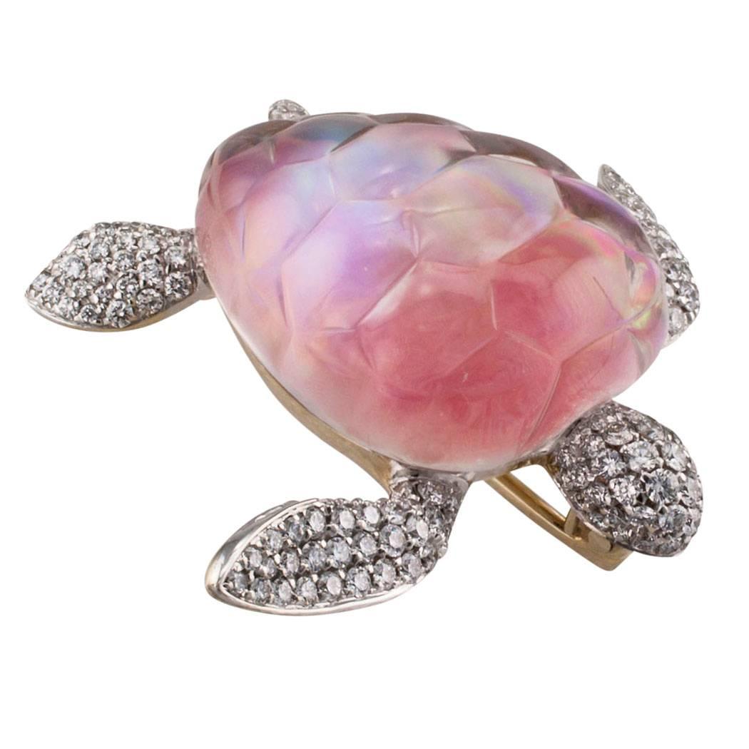 Vhernier sea turtle brooch set with pink mother of pearl diamonds and rock crystal on gold. The exotic sea turtle brooch features a carved rock crystal shell backed with pink mother of pearl, the head and extremities pavé-set with one hundred