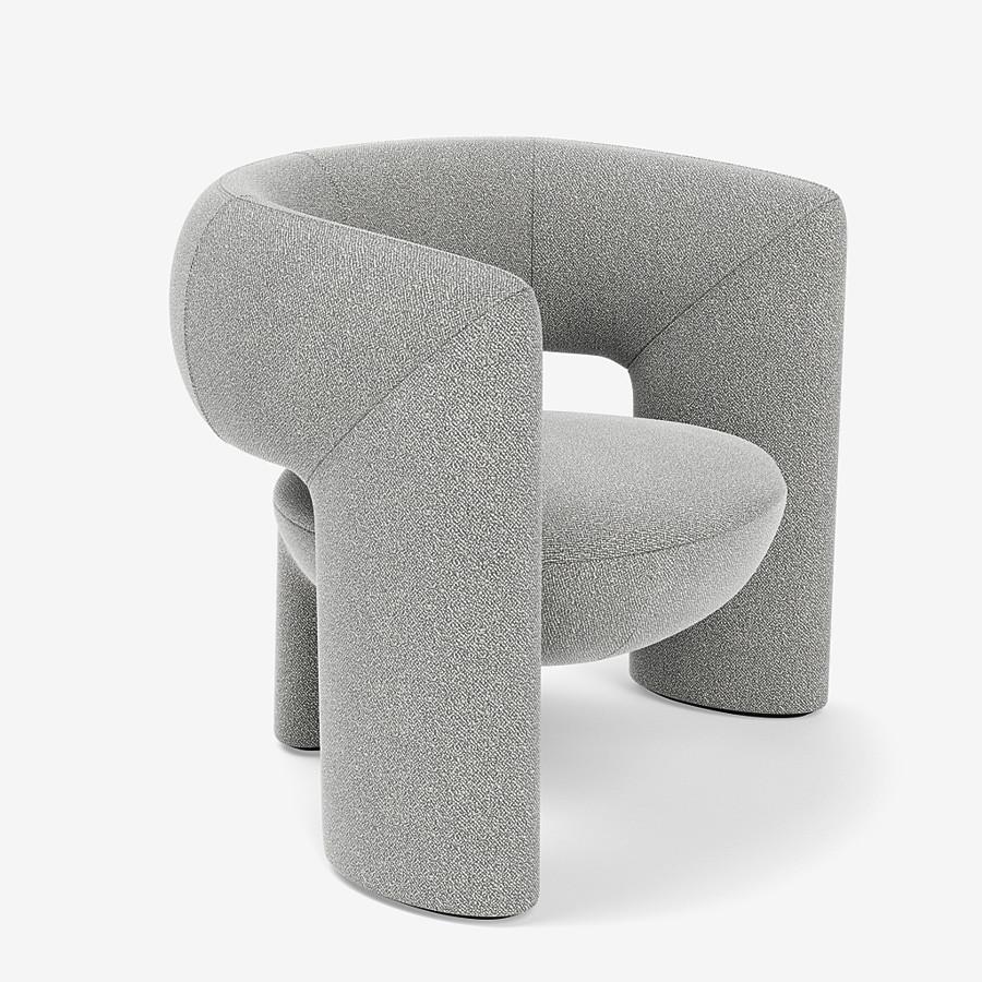 This Via del Corso lounge chair by Yabu Pushelberg is upholstered in Dermott Place boucle wool. Dermott Place comes in 4 colorways from Italy with a composition of 42% Wool, 33% Viscose, 24% Cotton and 1% Polyamid, a weight of 1040g/m and a