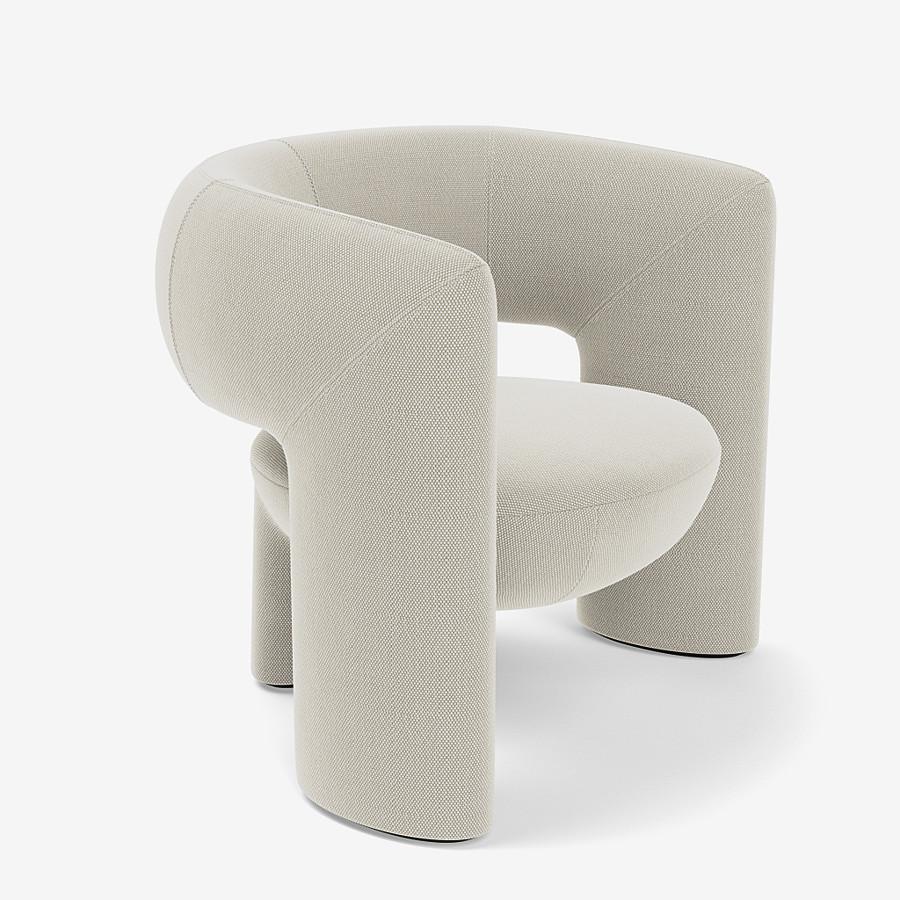 This Via del Corso lounge chair by Yabu Pushelberg is upholstered in Geneva Avenue textured wool. Geneva Avenue comes in 5 colorways from Germany with a composition of 96% Virgin Wool and 4% Polyamide, a weight of 1010g/m and a Martindale of 90,000