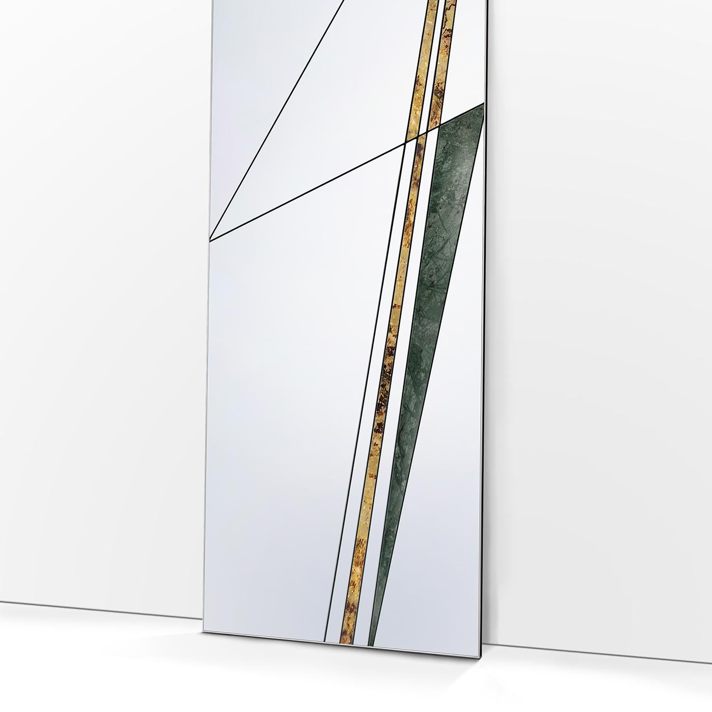 A bold series of lines intersect at the surface of this stunning mirror, creating an abstract interpretation of the network of roads in ancient Roman times. This stunning design is manufactured by hand on a wooden base, joining mirrored glass