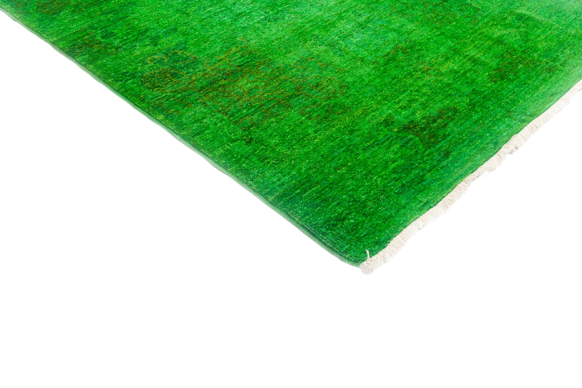 Color: Green - Made In: Pakistan. 100% Wool. The Colorful collection epitomizes classic with a twist: traditional patterns overdyed in brilliant color. Each hand-knotted rug is washed in a 100%-natural botanical dye that reveals hidden nuances in