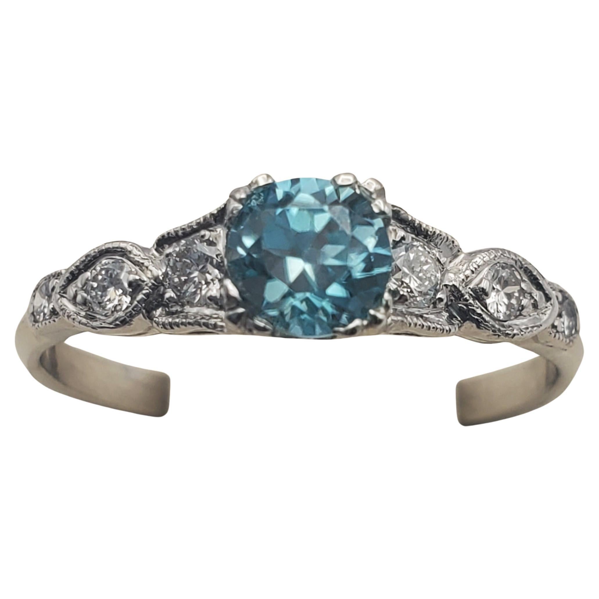 Vibrant 0.73ct Blue Zircon and Diamond Vintage Ring For Sale