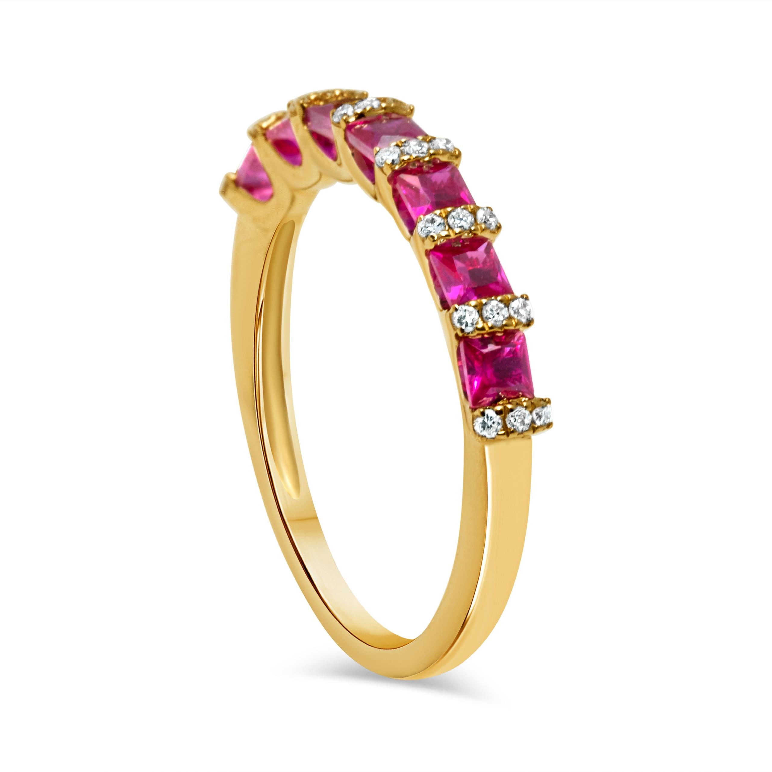 Fashion ring made with 14k yellow gold, featuring a 0.81-carat square emerald-cut ruby at the center. Surrounding the ruby are 24 round red diamonds totaling 0.11 carats, with a VS2-SI1 clarity rating, meaning the diamonds have minimal inclusions