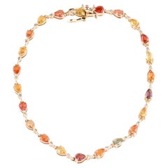 Armband aus lebhaftem 14 Karat Gelbgold mit mehrfarbigem Saphir und Diamanten