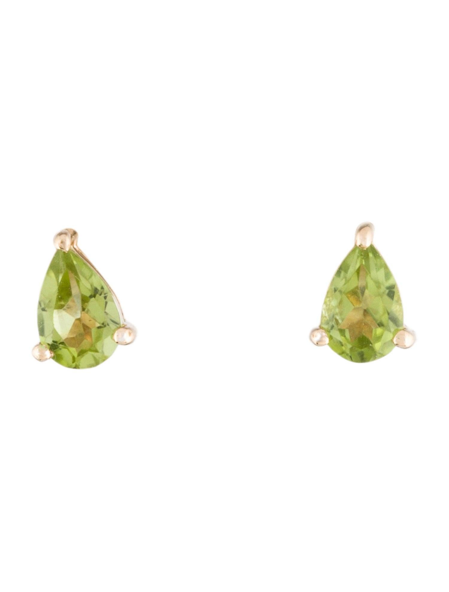 Introducing our captivating 14K Yellow Gold Stud Earrings, each featuring a pear-shaped modified brilliant Peridot, set to showcase the gemstone's vibrant green hue and exquisite brilliance. These earrings, crafted with precision, meld the timeless