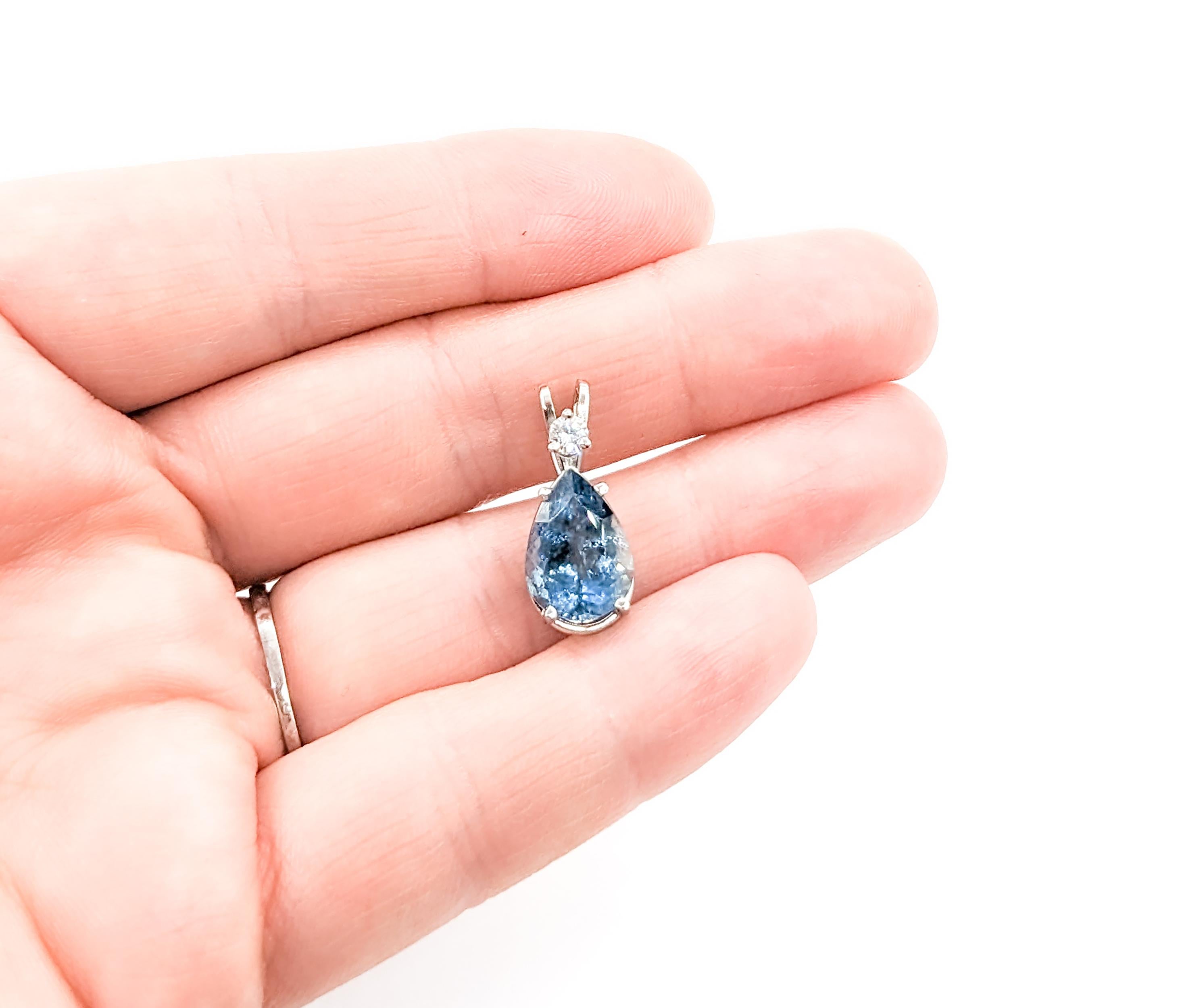 Vibrant 3.4ct Aquamarine & Diamond Platinum Pendant

Crafted from 950 platinum, this exquisite pendant showcases a stunning .12-carat round diamond with SI1 clarity and H-color. The pendant's centerpiece is a breathtaking 3.4 carat pear-cut