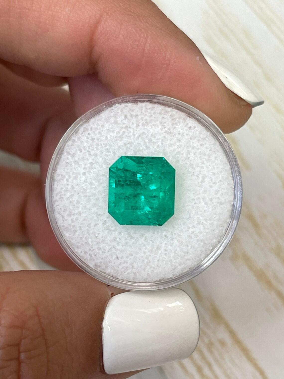 Stone: Emerald
Weight: 4.83-carats
Shape: Asscher Cut
Clarity: Transparent
Luster: Excellent
Color: Bright Green
Measurements: 10.18mm x 9.85mm x 7.97mm
Geographic Origin: Colombia
Treatment: Natural, Oiling

Comments: Due to their growth conditions