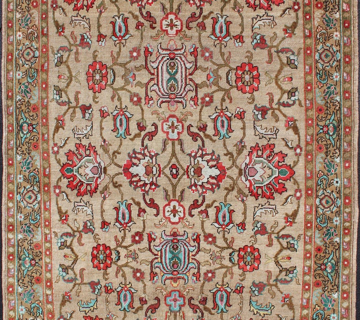 Tan and red tribal all-over design Oushak vintage rug from Turkey, rug TU-MTU-4934, country of origin / type: Turkey / Oushak, circa 1930.

This magnificent vintage Turkish Oushak displays a glorious coloration paired with a beautiful and vibrant