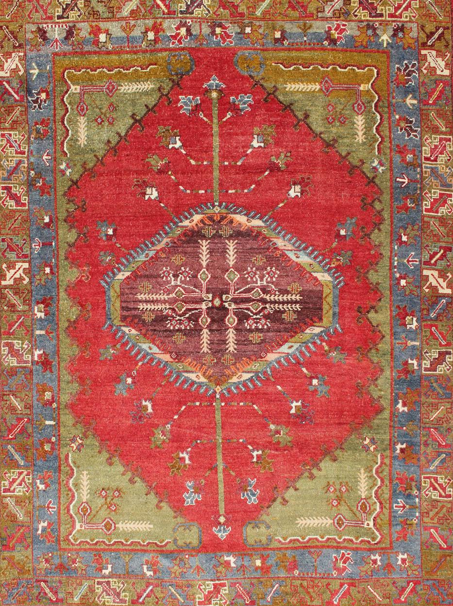 Hand-Knotted Antique Turkish Medallion Oushak Rug in Red, Green and Blue For Sale