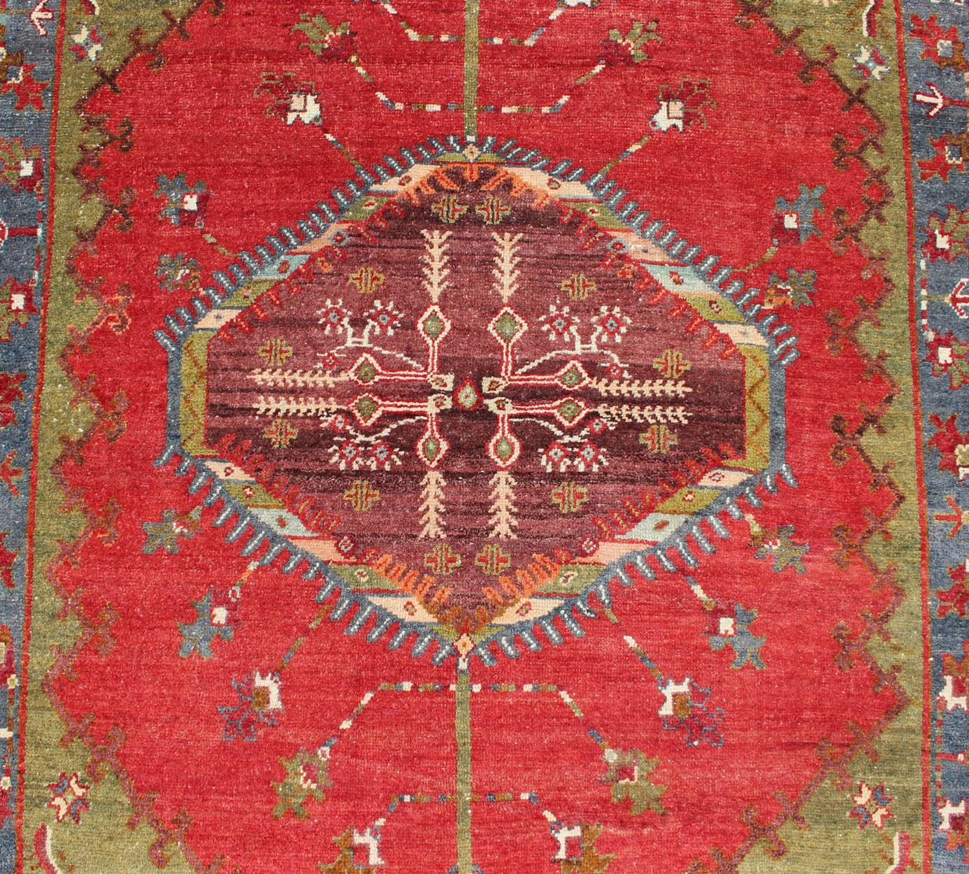 Wool Antique Turkish Medallion Oushak Rug in Red, Green and Blue For Sale