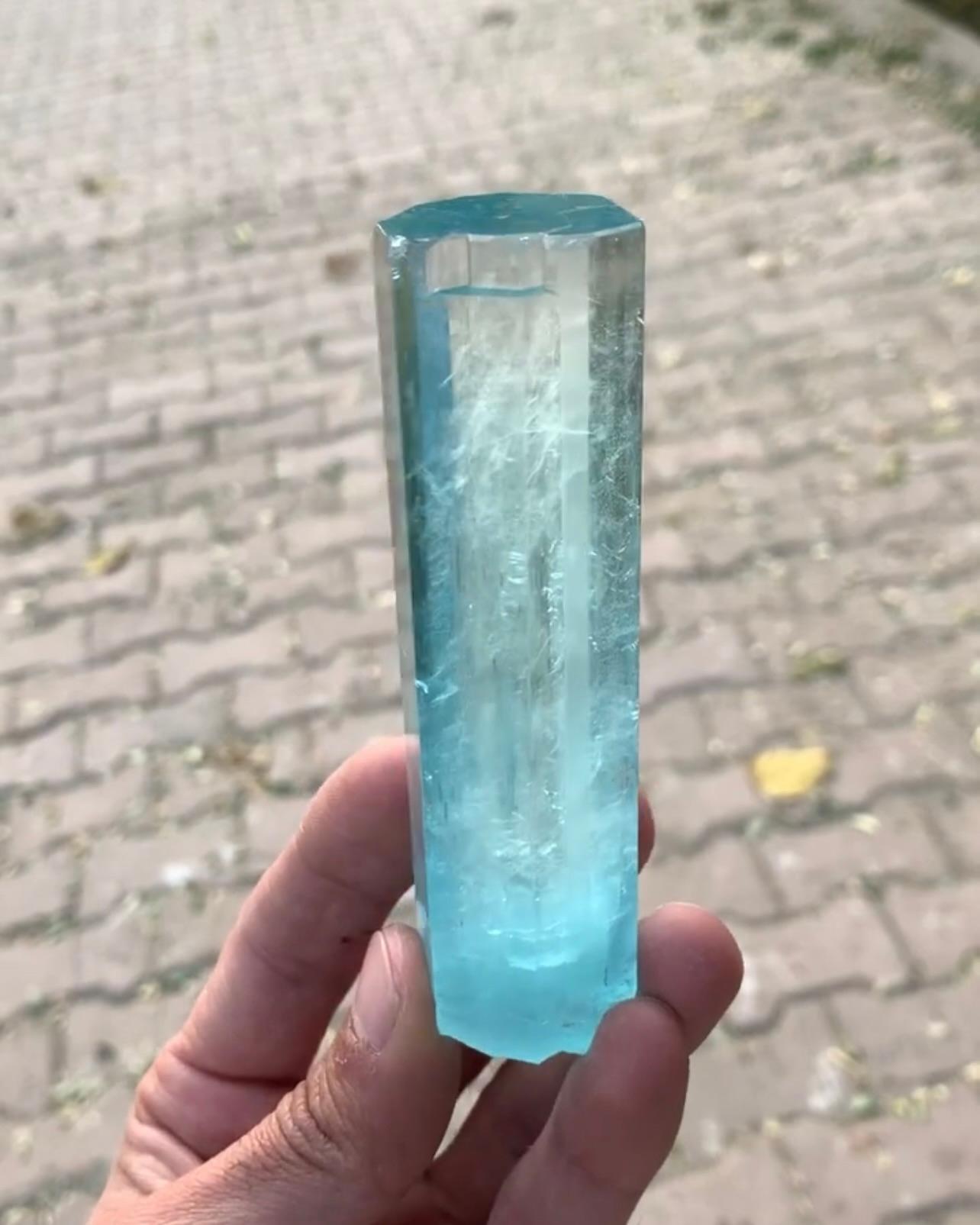 Product Information:

Specimen Name: Aquamarine Crystal

Weight: 192 grams

Dimension: H: 10.5 x W: 3.3 x D: 3 cm

Treatment: None

Origin: Skardu District, Gilgit Baltistan Province, Pakistan 

Description:

The Aquamarine Crystal with a round