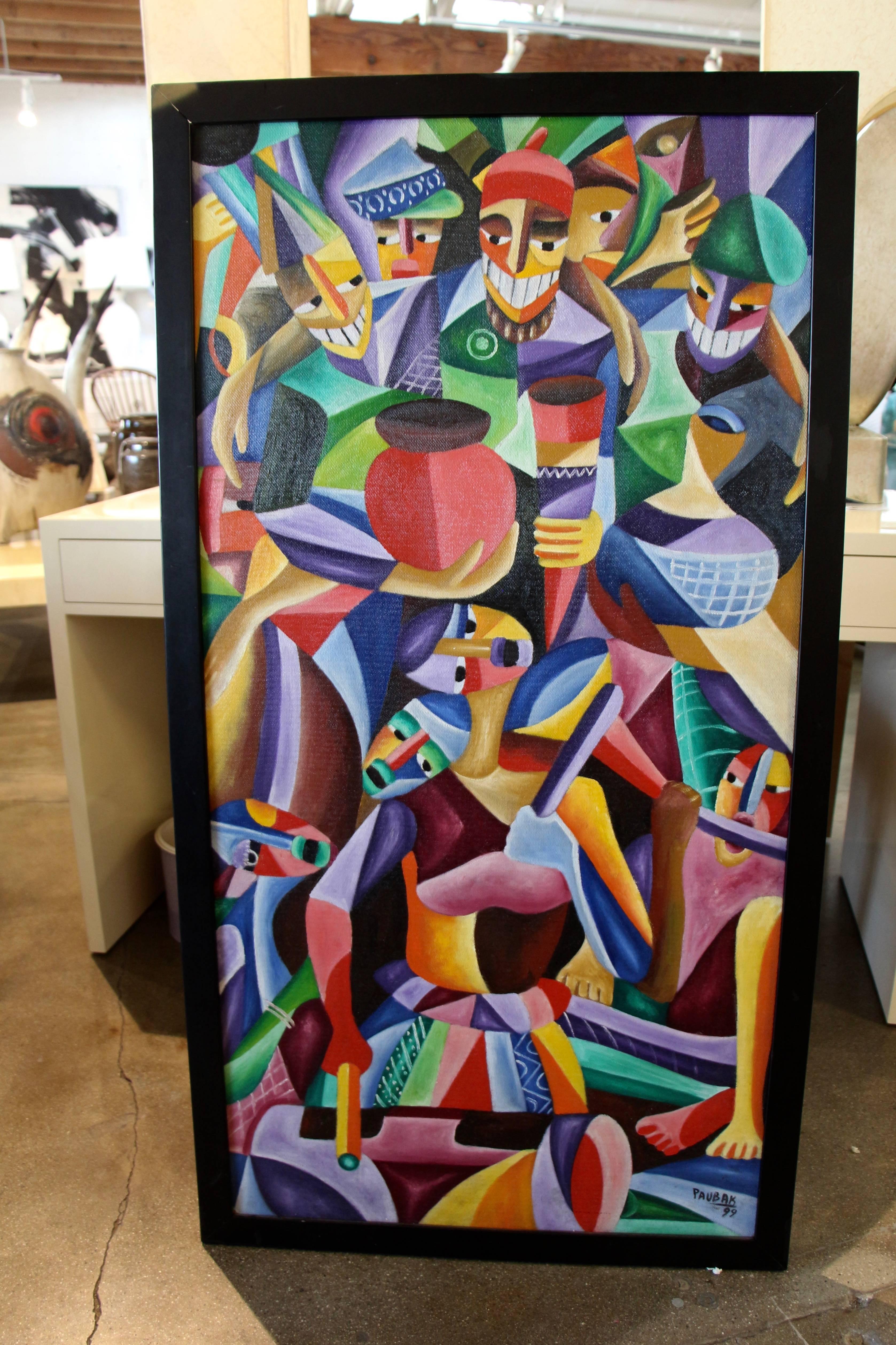 A nice vibrant cubist painting signed Paubak. Painted on board. It is framed in a simple black frame that has losses and has been retouched in areas. The corners of the frame do not meet flush. Minor losses to the paint.