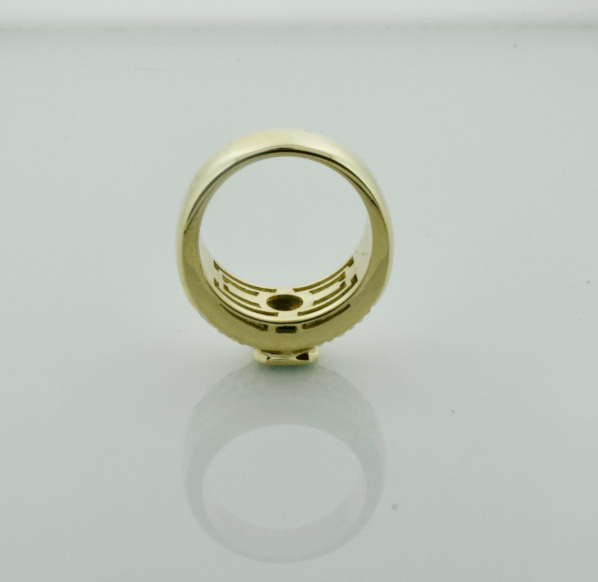 Ring mit lebhaftem Smaragd und Diamant aus 18 Karat Gelbgold für Damen oder Herren im Angebot