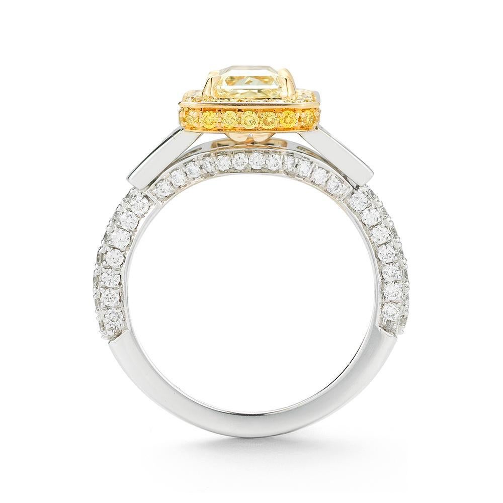 18k White Gold 2.47ct Yellow Diamond Ring 

A vibrant fancy yellow diamond shines from the center of this perfectly
balanced ring.
Item: # 02760
Metal: 18k W / Y
Lab: Gia
Diamond Weight: 2.47 ct.