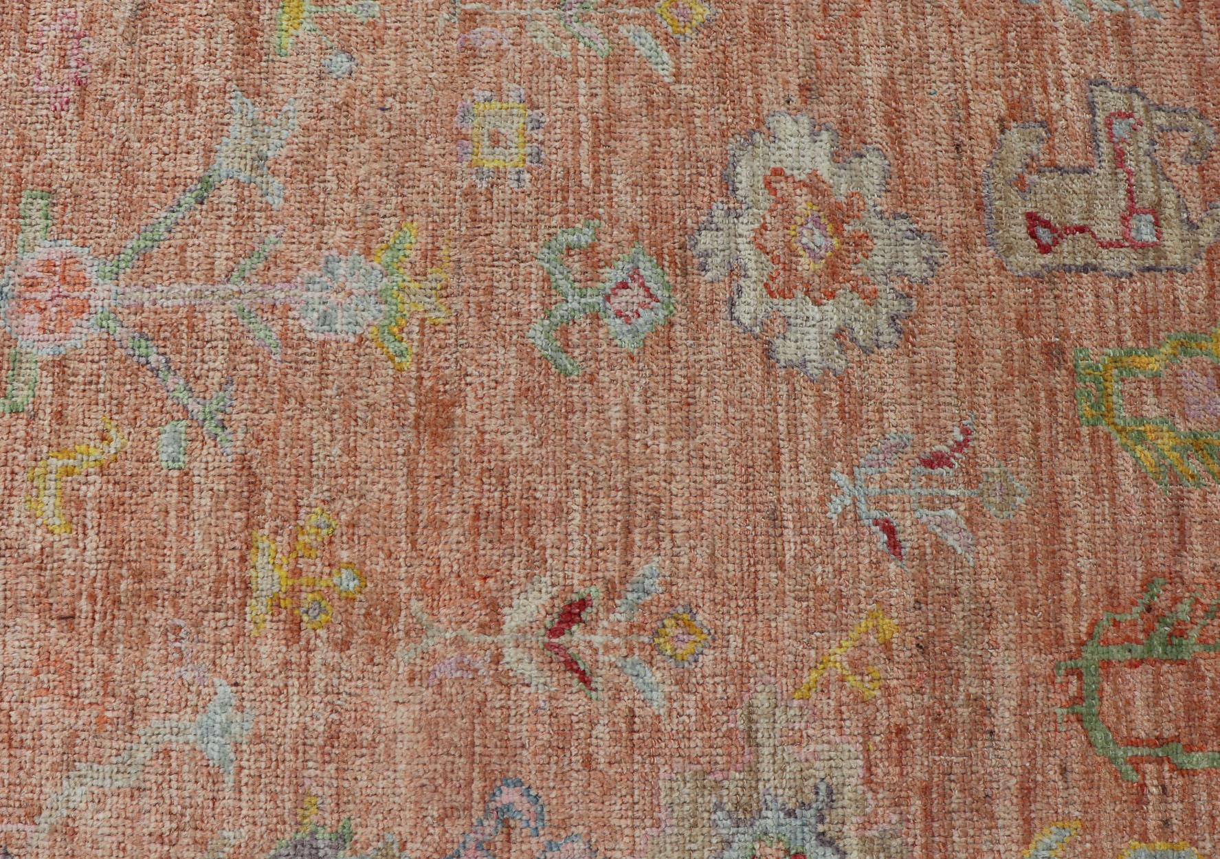 Vibrant Floral Medley on Salmon Pink Hand-Knotted Rug by Keivan Woven Arts  3
