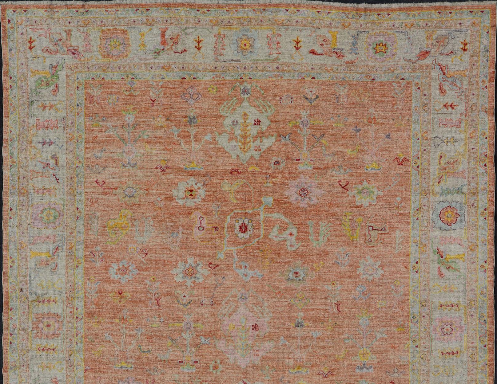 Vibrant Floral Medley on Salmon Pink Hand-Knotted Rug by Keivan Woven Arts  For Sale 4
