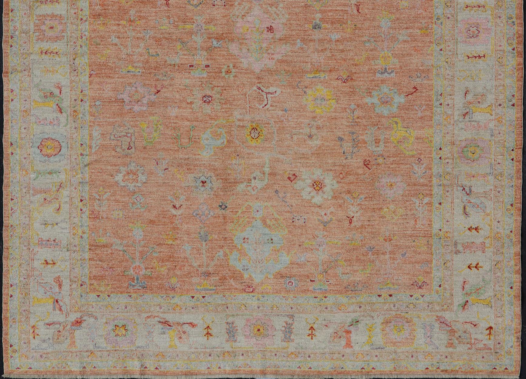 Vibrant Floral Medley on Salmon Pink Hand-Knotted Rug by Keivan Woven Arts  6