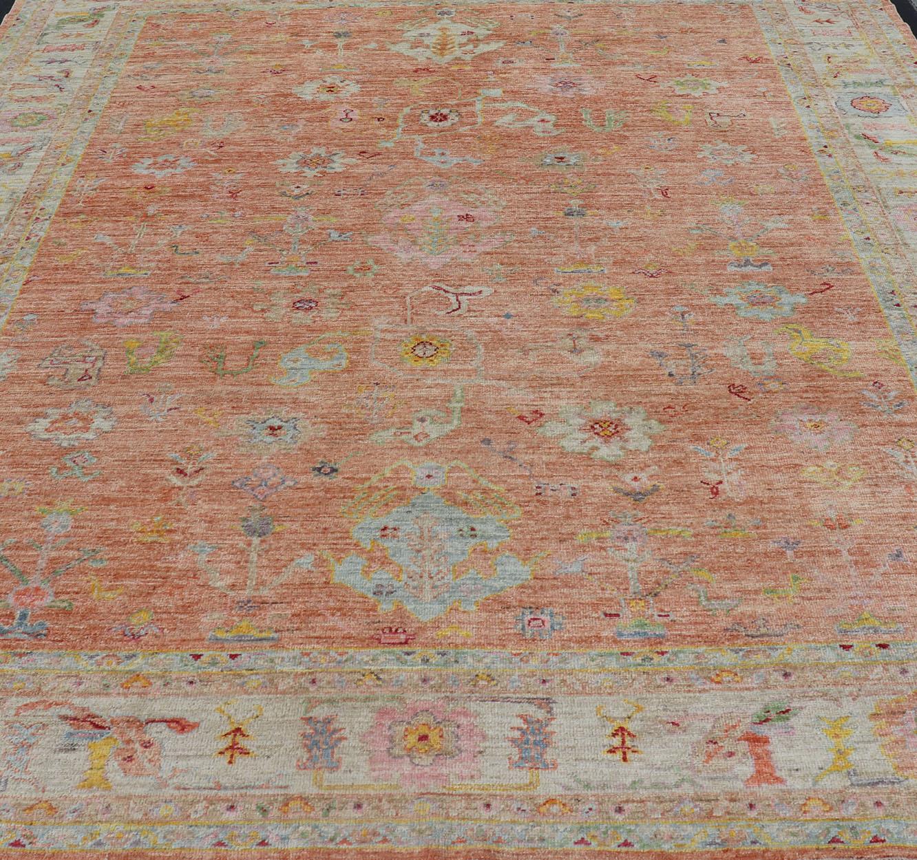 Vibrant Floral Medley on Salmon Pink Hand-Knotted Rug by Keivan Woven Arts  For Sale 9