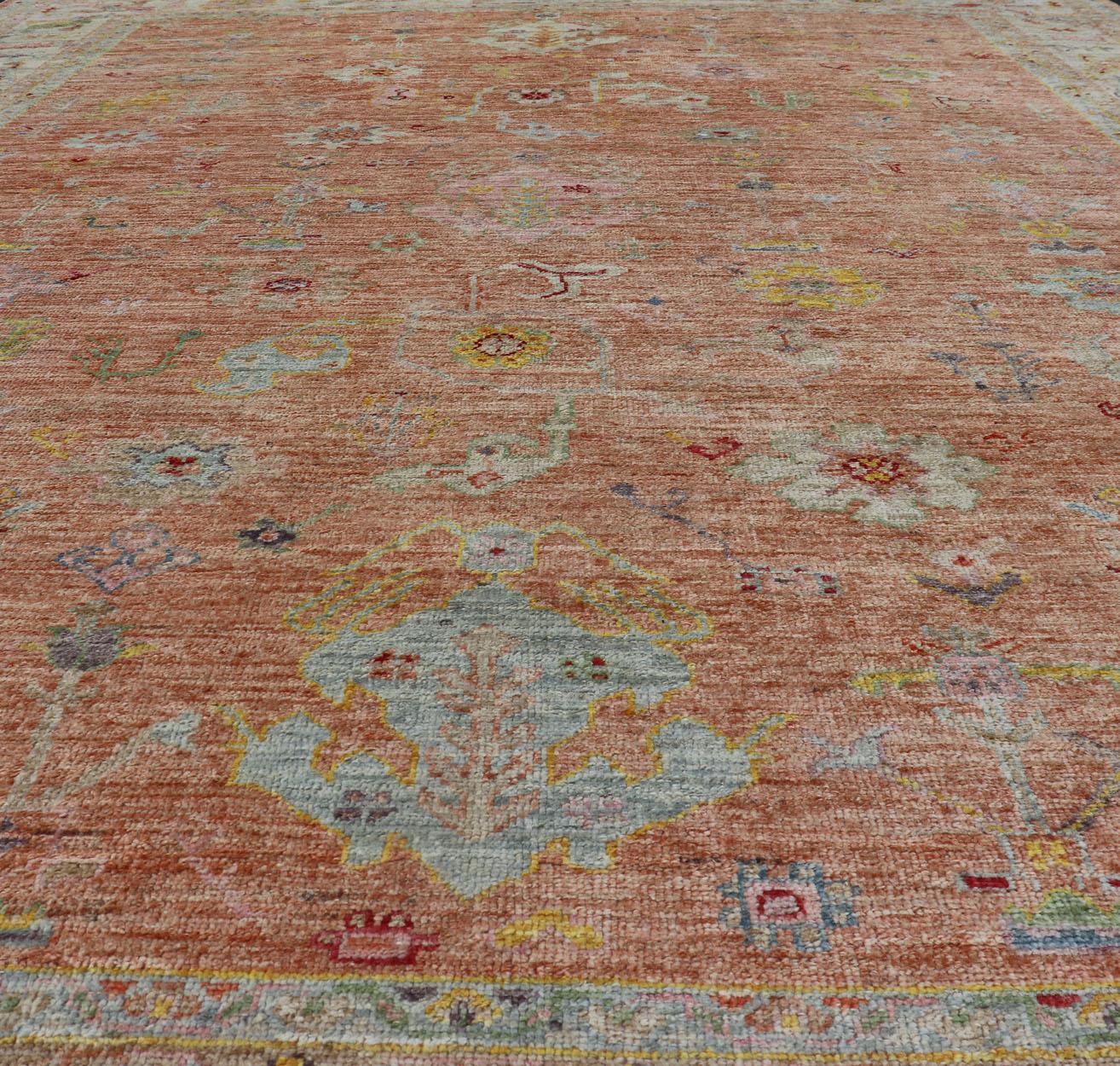 Vibrant Floral Medley on Salmon Pink Hand-Knotted Rug by Keivan Woven Arts  For Sale 10
