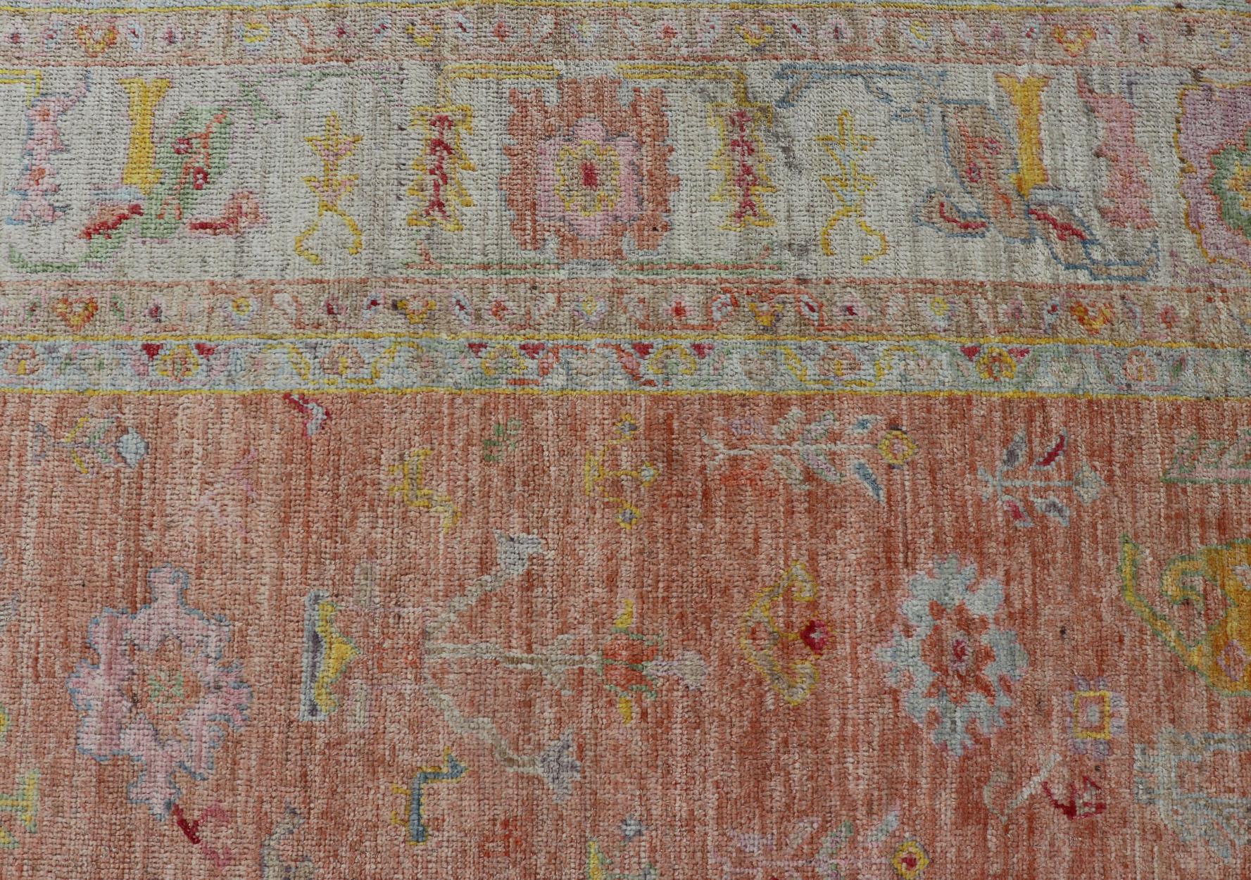Vibrant Floral Medley on Salmon Pink Hand-Knotted Rug by Keivan Woven Arts  In New Condition In Atlanta, GA