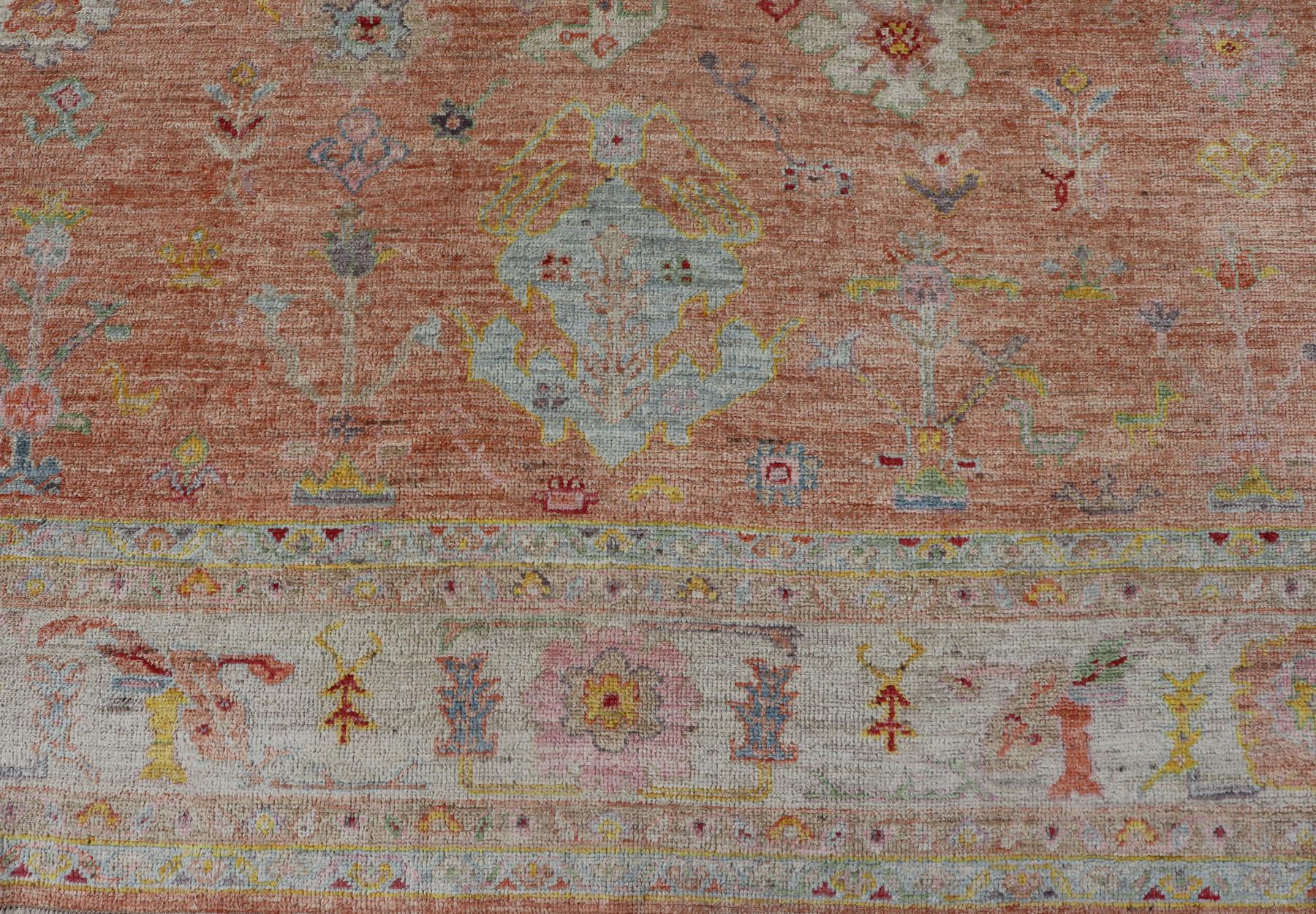 Contemporary Vibrant Floral Medley on Salmon Pink Hand-Knotted Rug by Keivan Woven Arts 