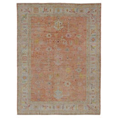 Handgeknüpfter Teppich in Lachsrosa mit lebhaftem, geblümtem Medley von Keivan Woven Arts 