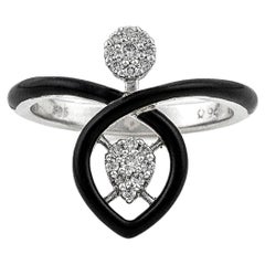 Bague en or vibrant avec diamants et émail noir