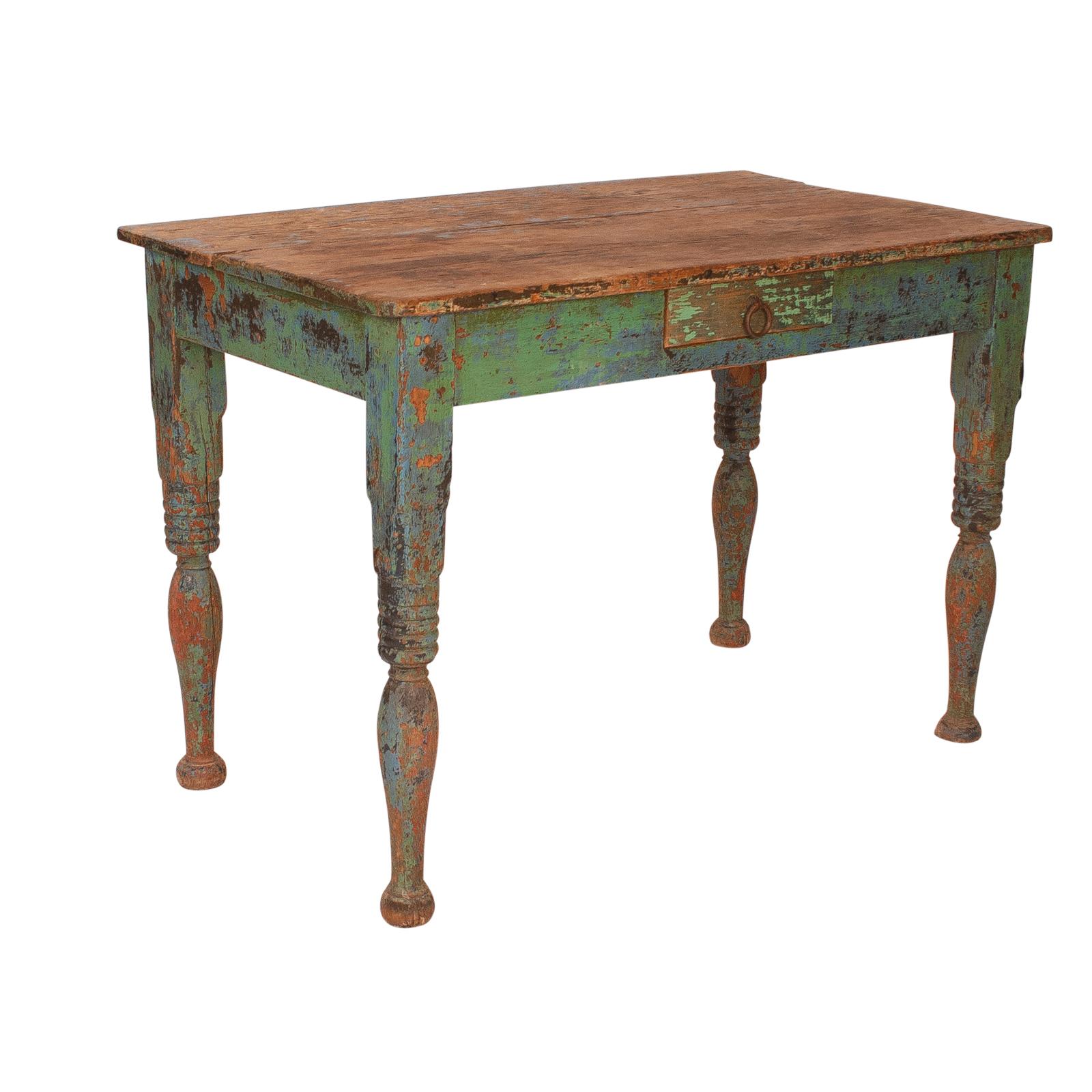A late 19th century Spanish Colonial green painted pine work table, with one drawer, circa 1880.