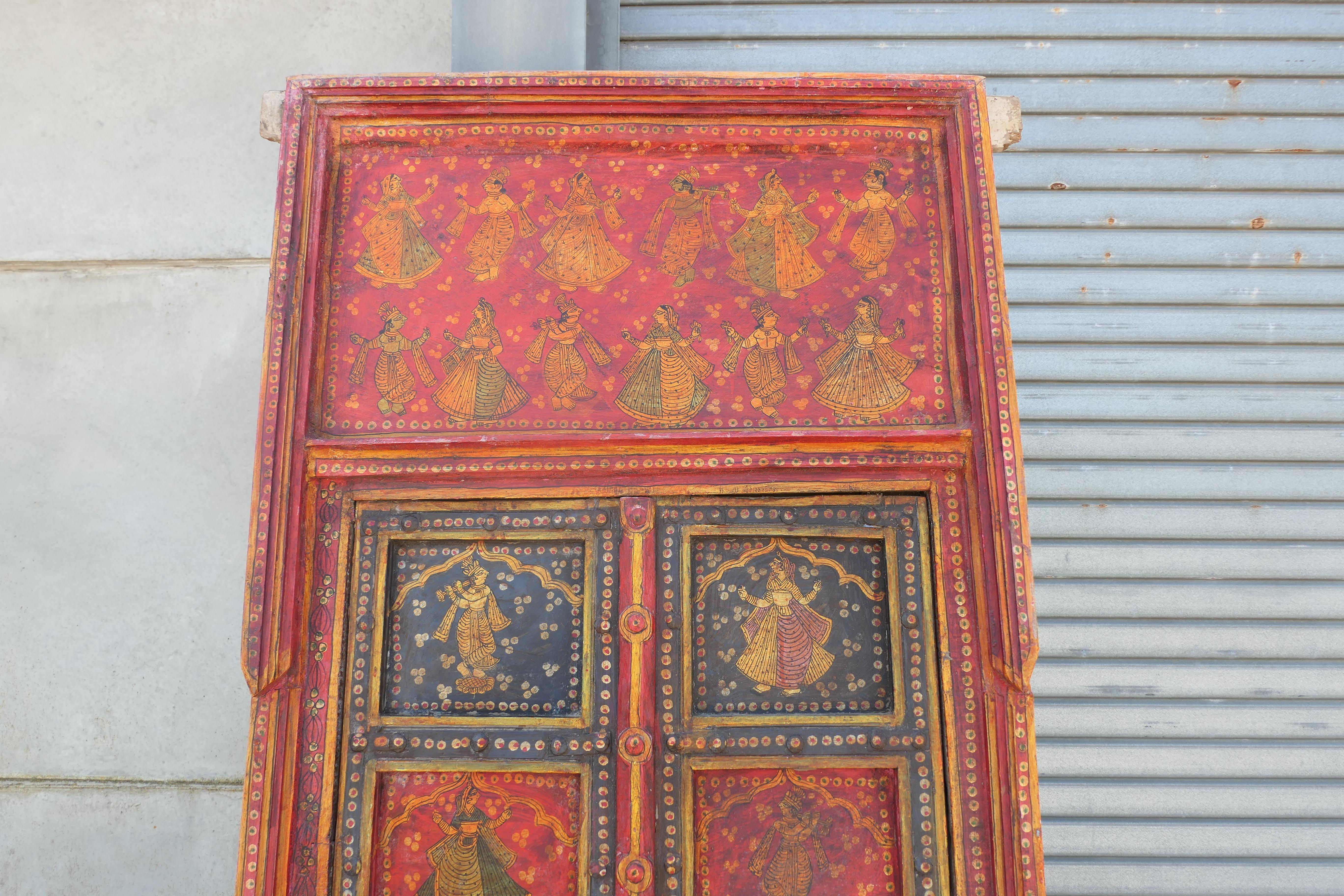 Vibrant Indian Painted Doors in Original Frame, Wall Art

These beautiful weathered wooden doors would look fabulous on a wall as decoration or relocated in a doorway
The panelled doors come in their original Frame they have been fixed in the closed