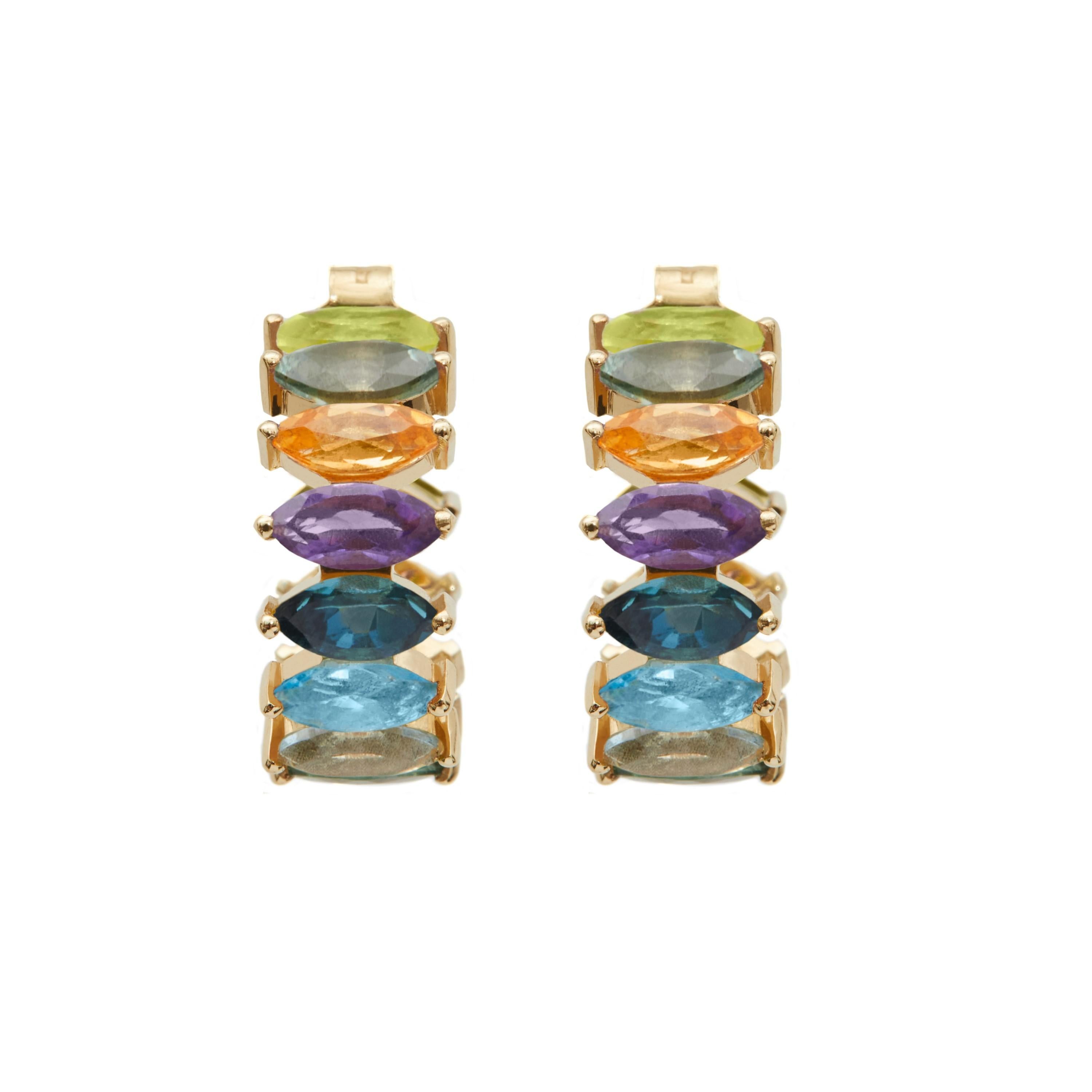 Made in 18k yellow gold, the vibrant mosaic hoop earrings are dazzling in marquise gemstones, making it an easy pop to any outfit. These earrings are sold as a pair. 