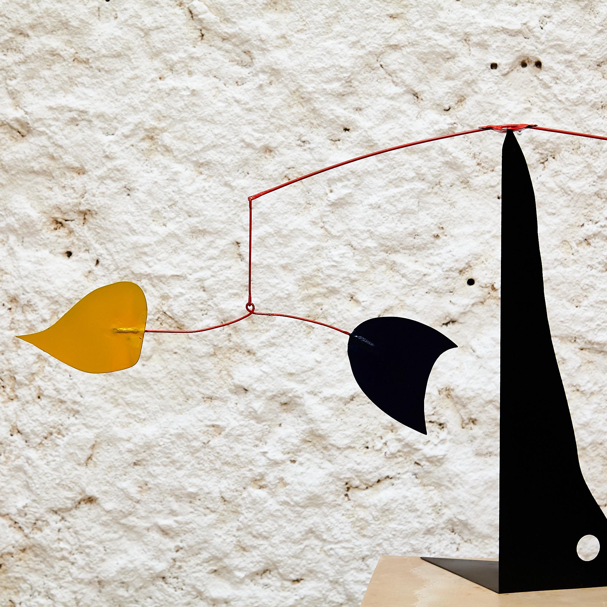 Vibrant Motion: Kinetic Sculpture - Iron, Paint, Movement 3