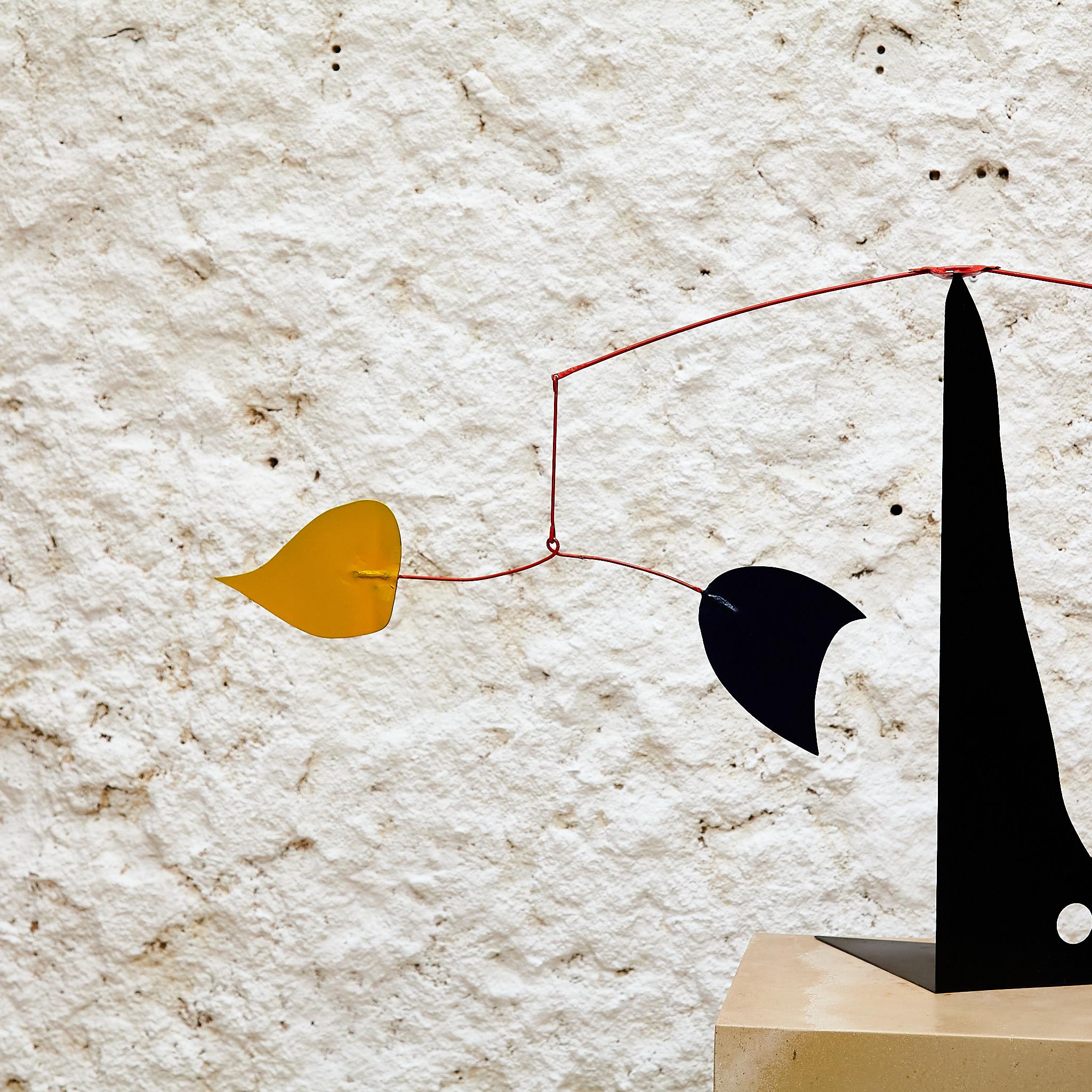 Vibrant Motion: Kinetic Sculpture - Iron, Paint, Movement 2