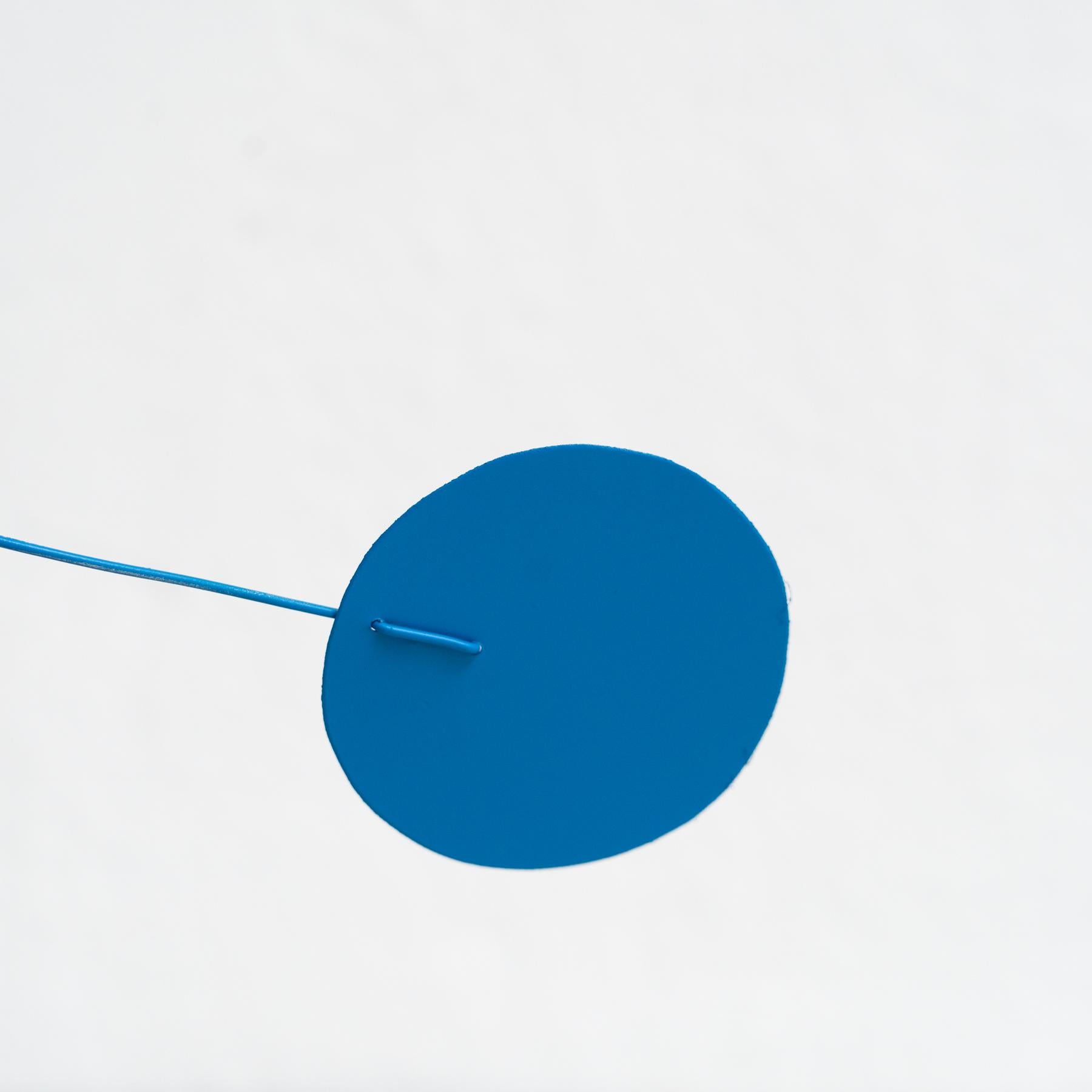 Vibrant Motion: Kinetic Sculpture - Iron, Paint, Movement 3