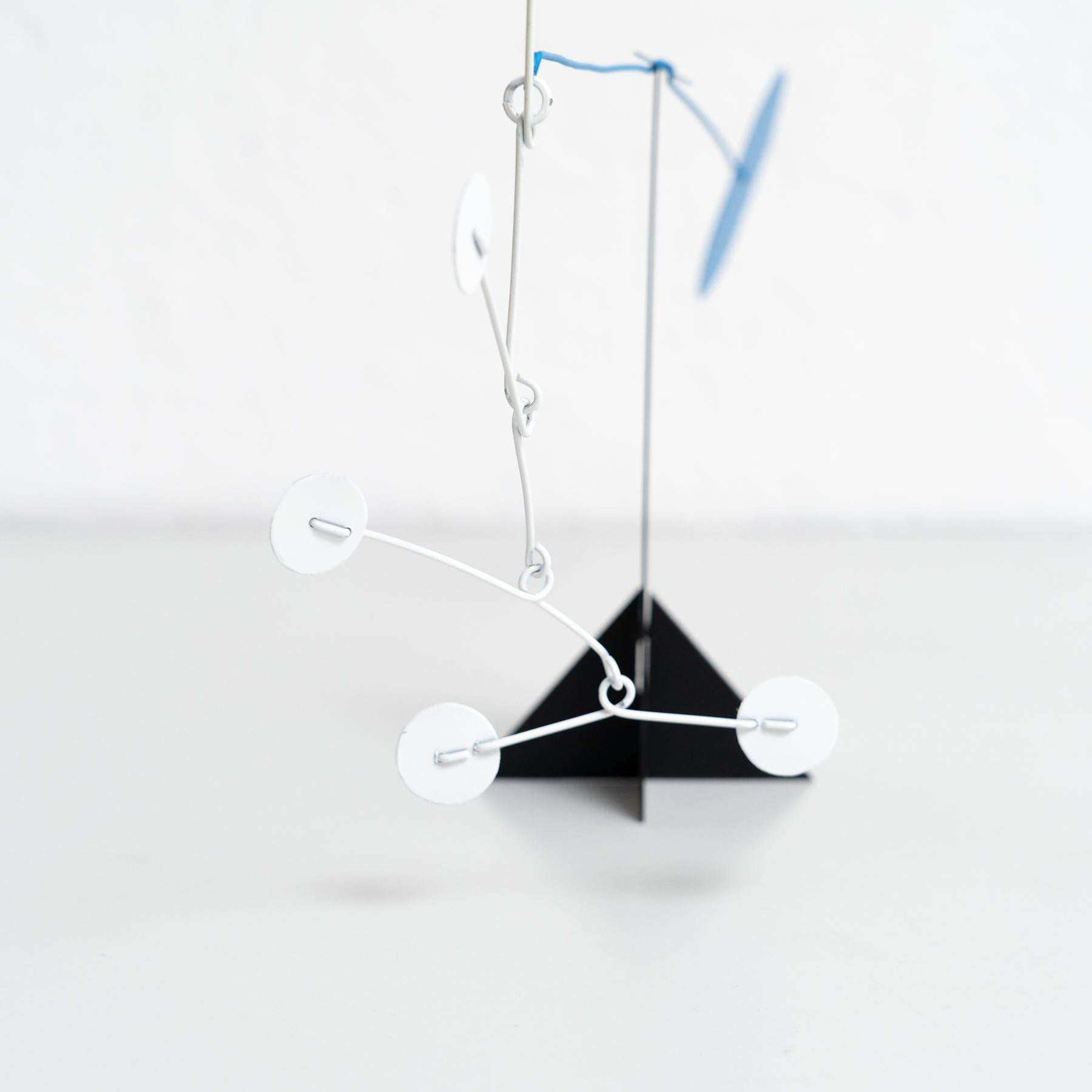 Vibrant Motion: Kinetic Sculpture - Iron, Paint, Movement 4