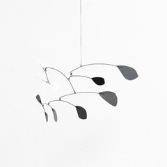 Vibrant Motion: Kinetic Sculpture - Iron, Paint, Movement