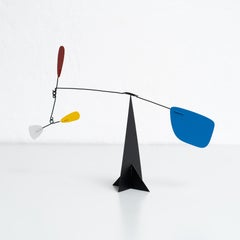Vibrant Motion: Kinetic Sculpture - Iron, Paint, Movement
