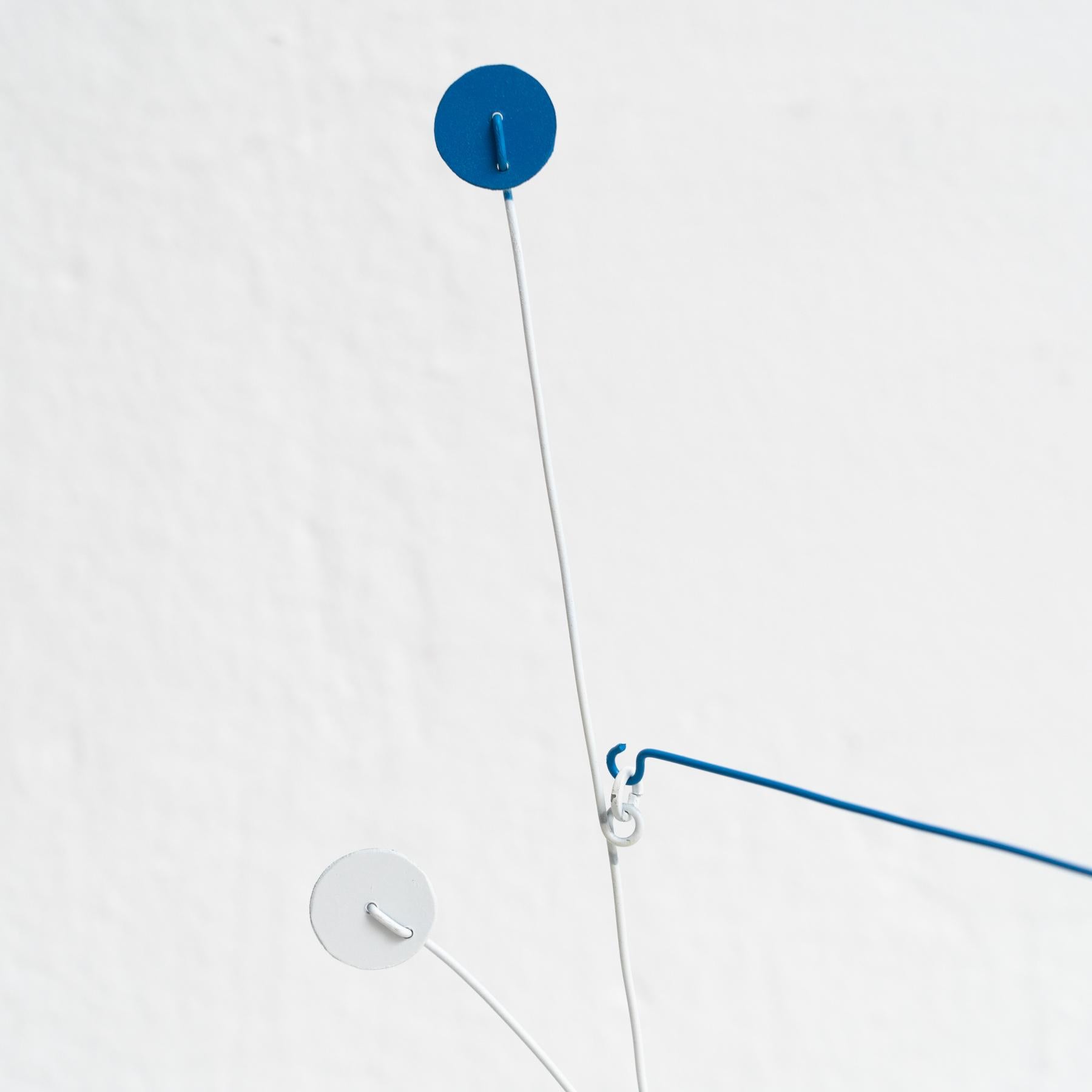 Vibrant Motion: Kinetic Sculpture - Iron, Paint, Movement 2